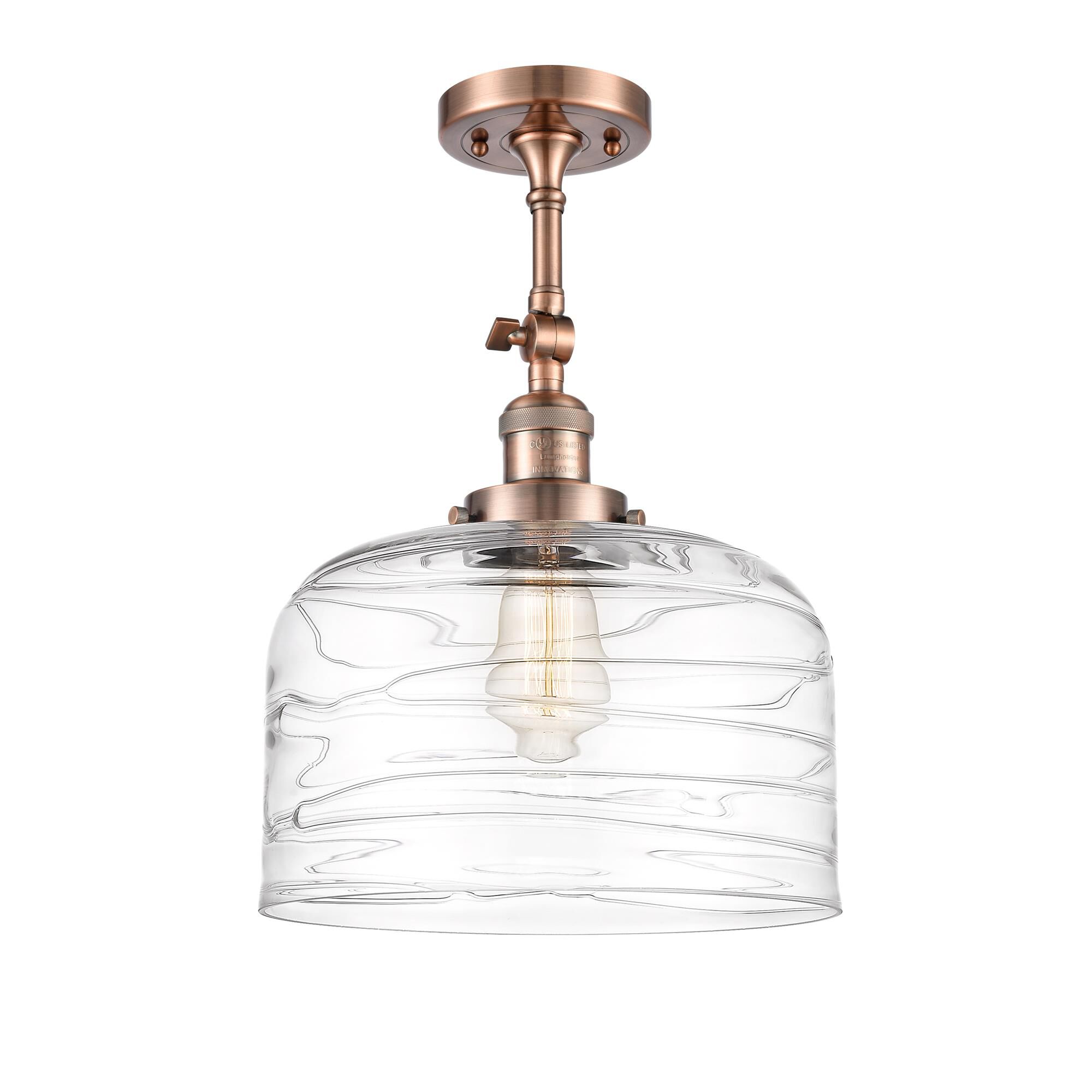Shown in Antique Copper finish and Clear Deco Swirl X-Large Bell glass