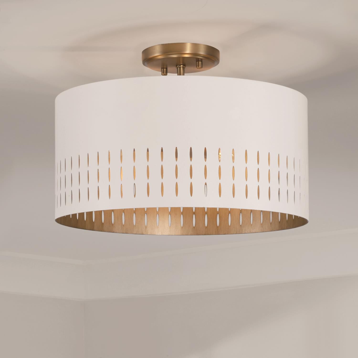 Shown in Aged Brass and White finish and White Metal  with Painted Aged Brass Interior shade