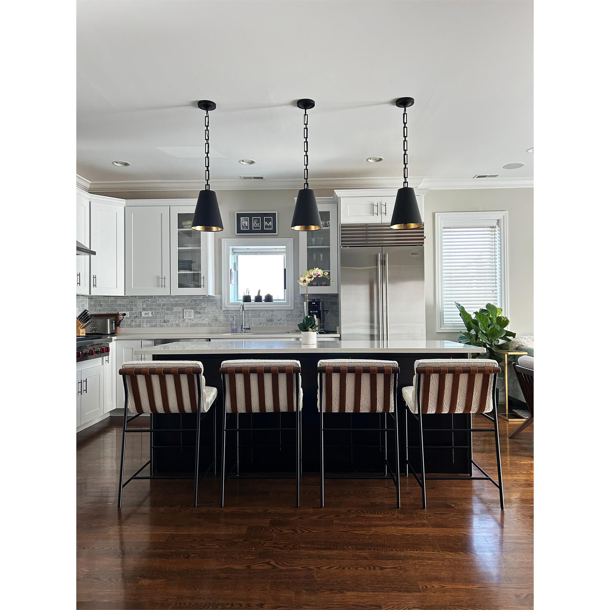 Shown in Matte Black + Antique Gold finish and Iron glass and Black shade