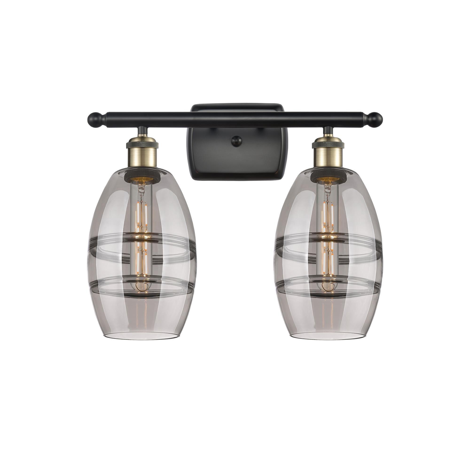 Shown in Black Antique Brass finish and Light Smoke glass