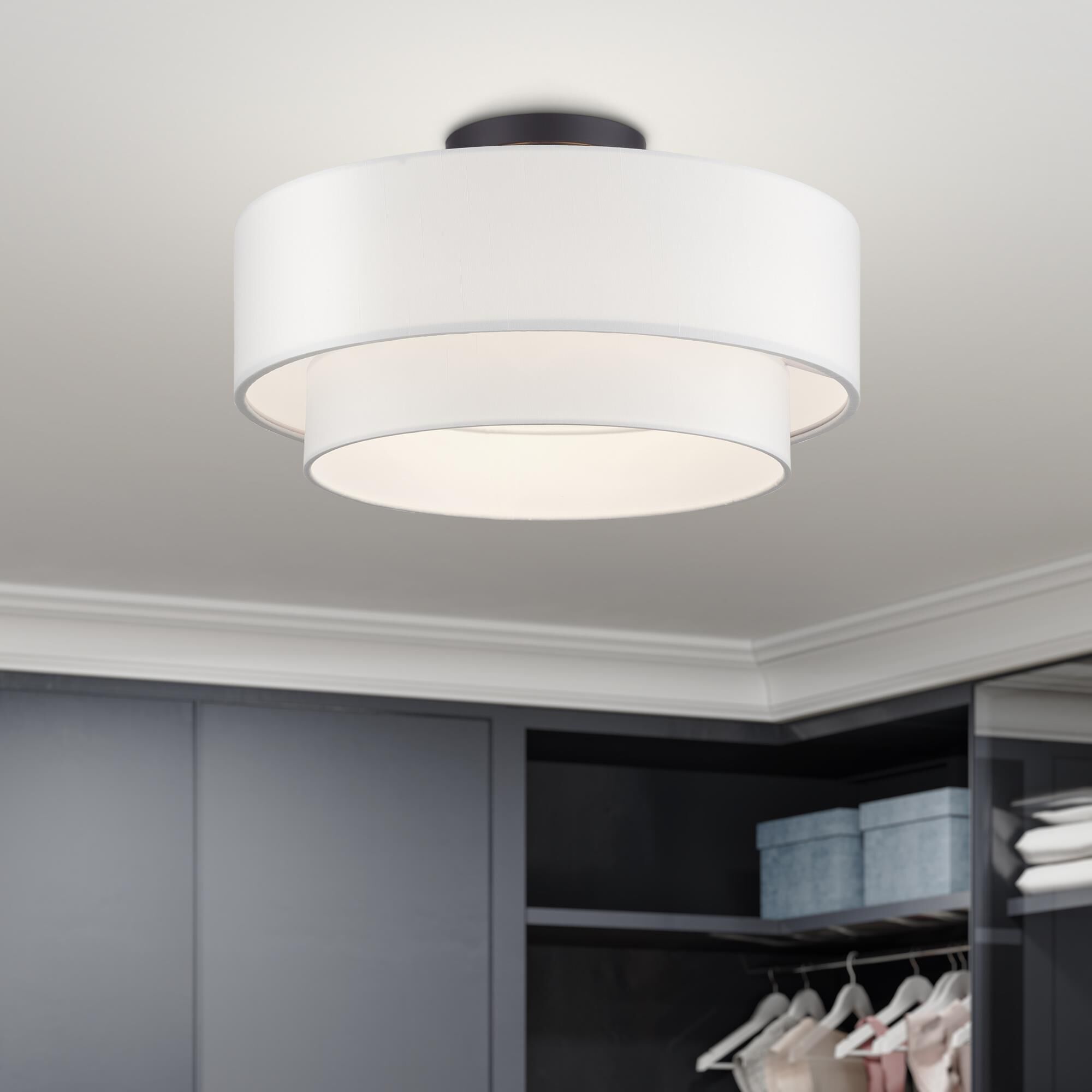 Shown in Bronze finish and Hand Crafted Off-White Fabric Hardbacks with White Fabric Inside shade