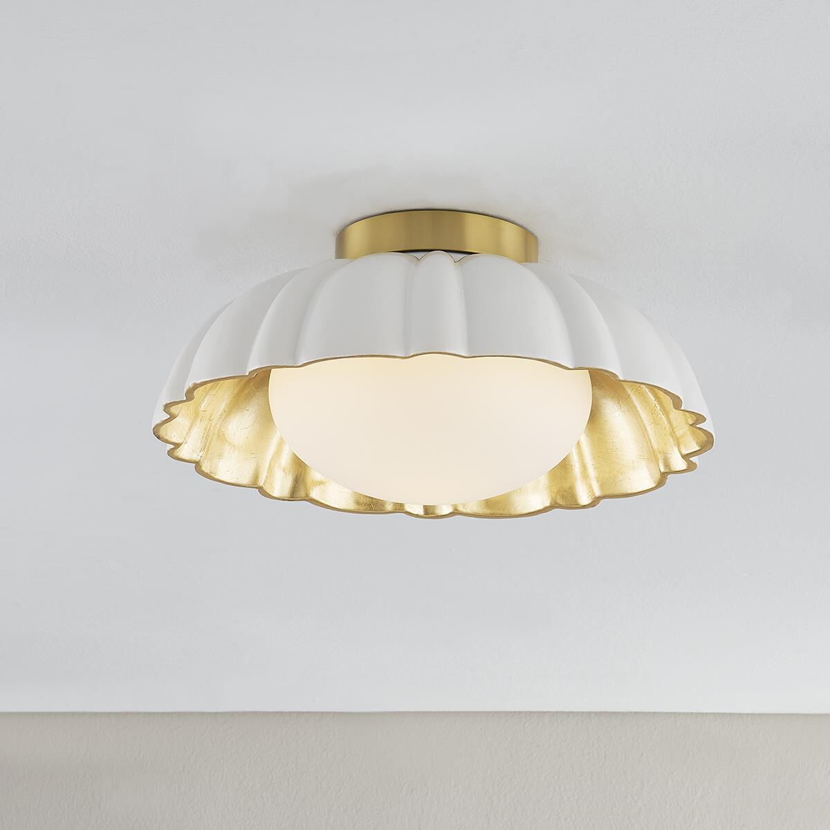 Shown in Aged Brass finish and Opal Glossy glass