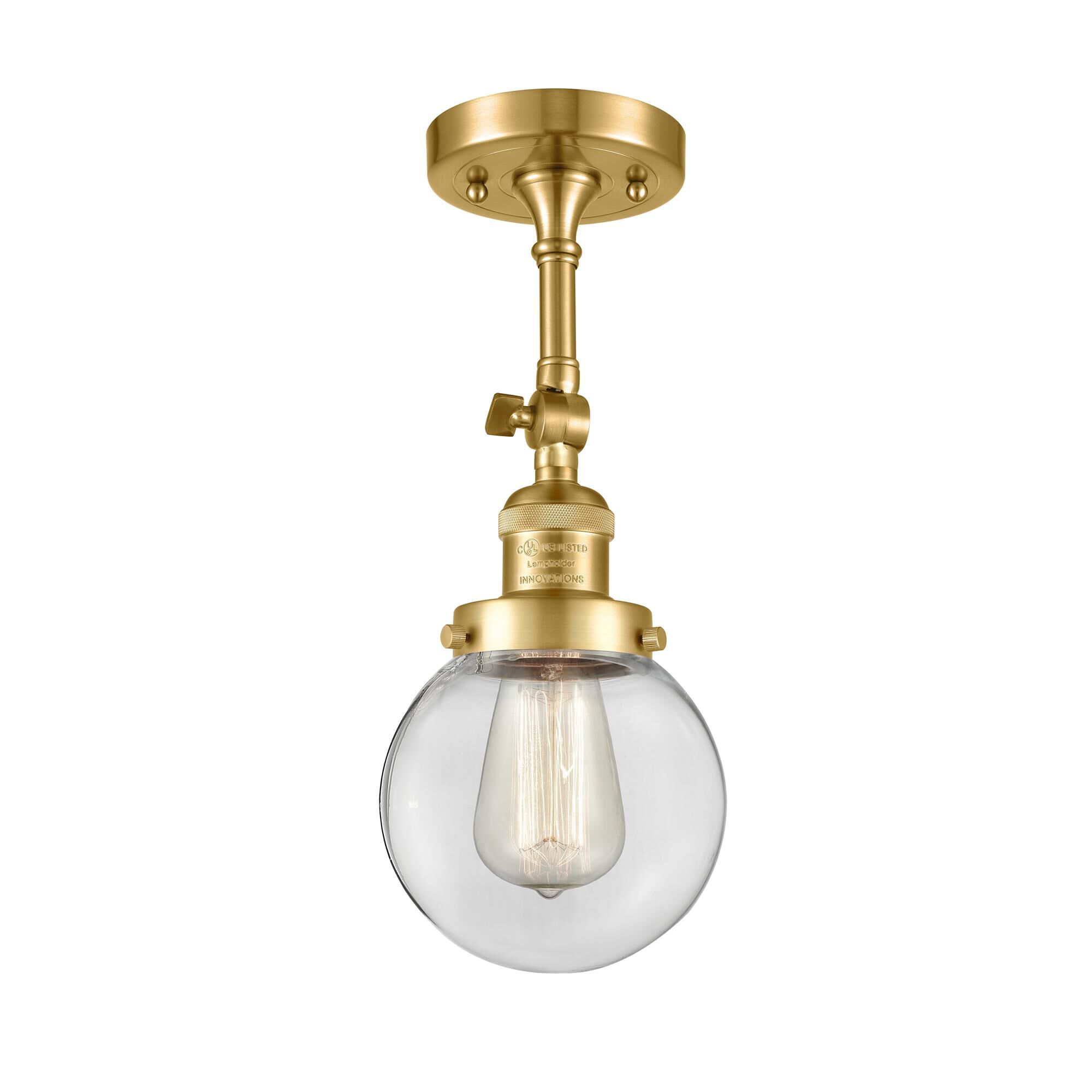 Shown in Satin Gold finish and Clear glass and None accent