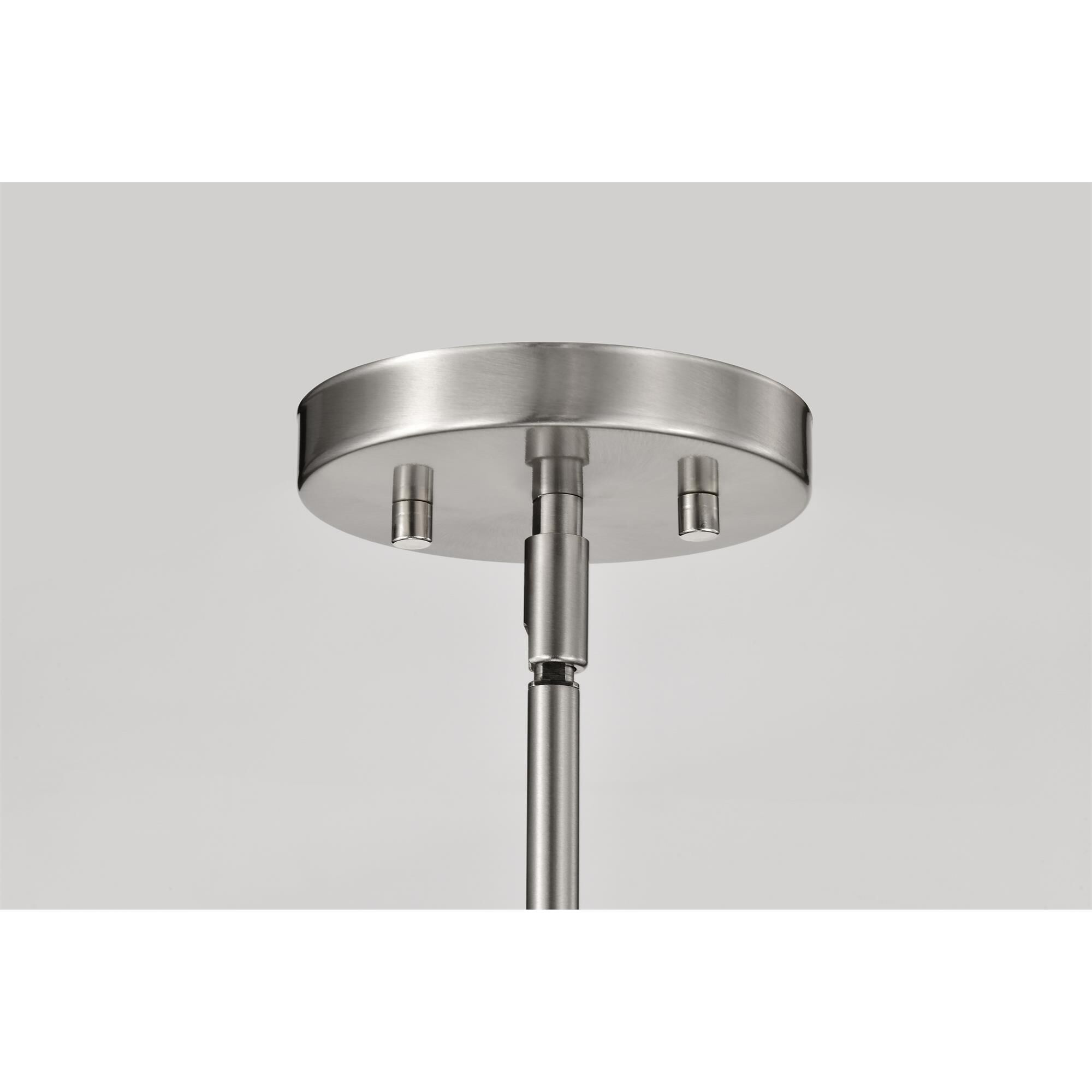 Shown in Brushed Nickel finish and Ribbed White glass