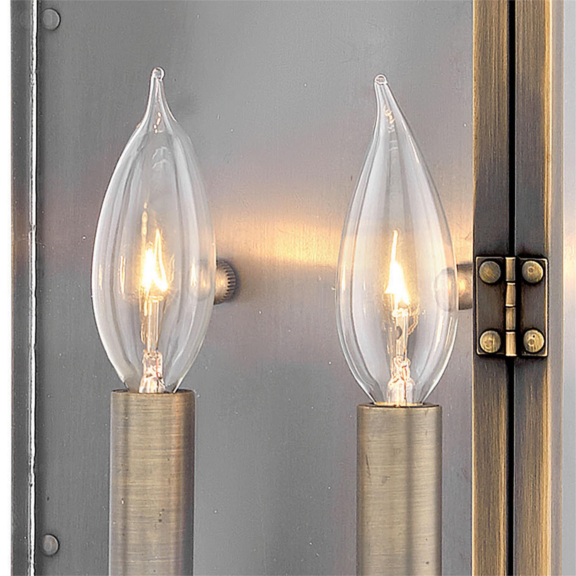 Shown in Dark Antique Brass finish and Clear glass