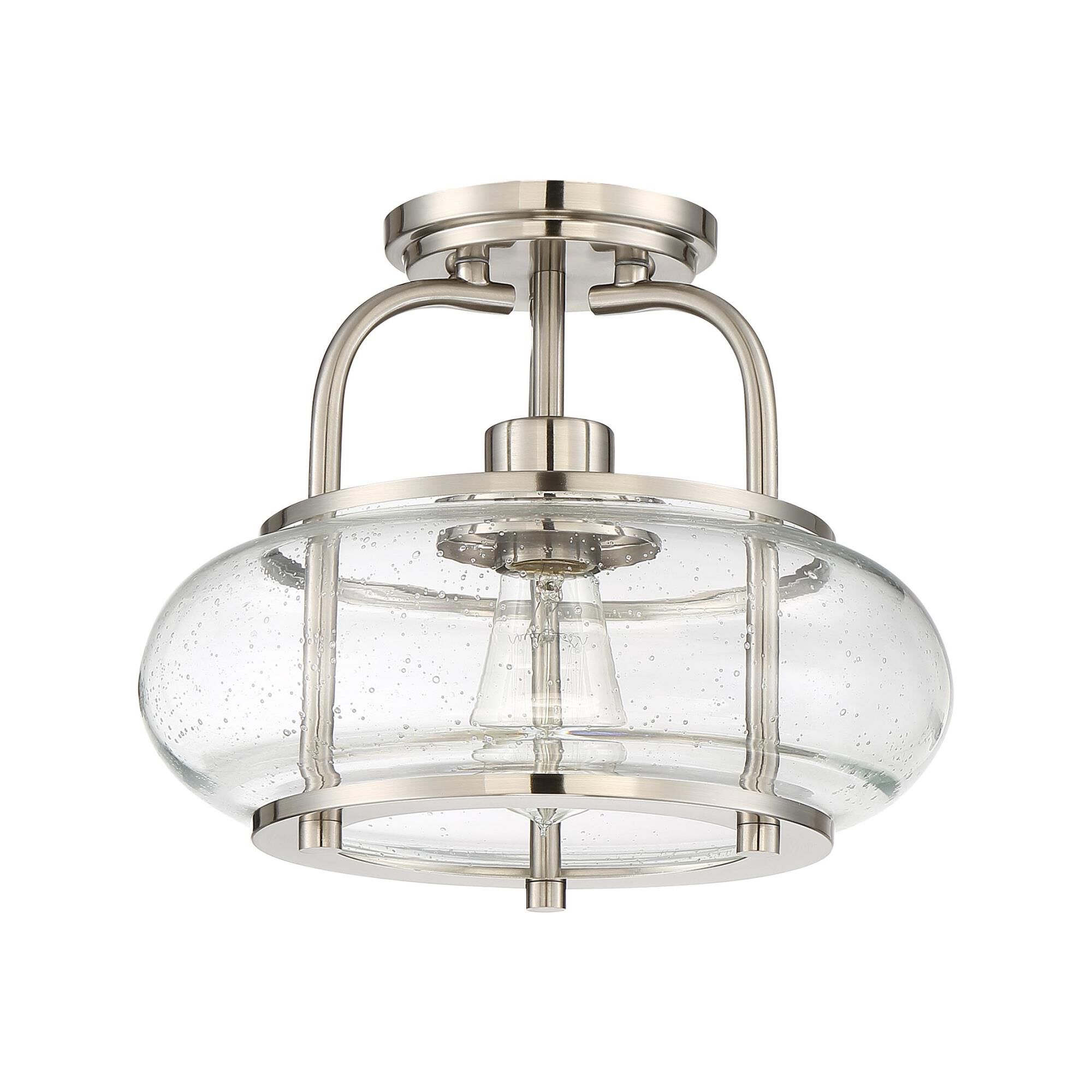 Shown in Brushed Nickel finish and Clear Seedy glass