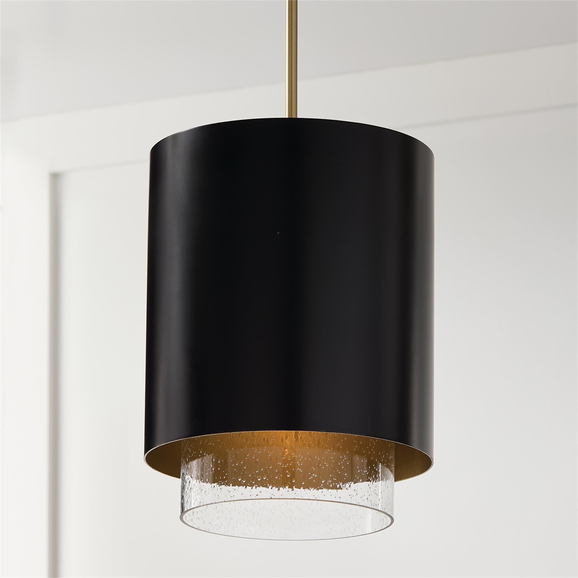 Shown in Matte Brass and Black finish and Clear Seeded glass and Metal with Brass Interior shade