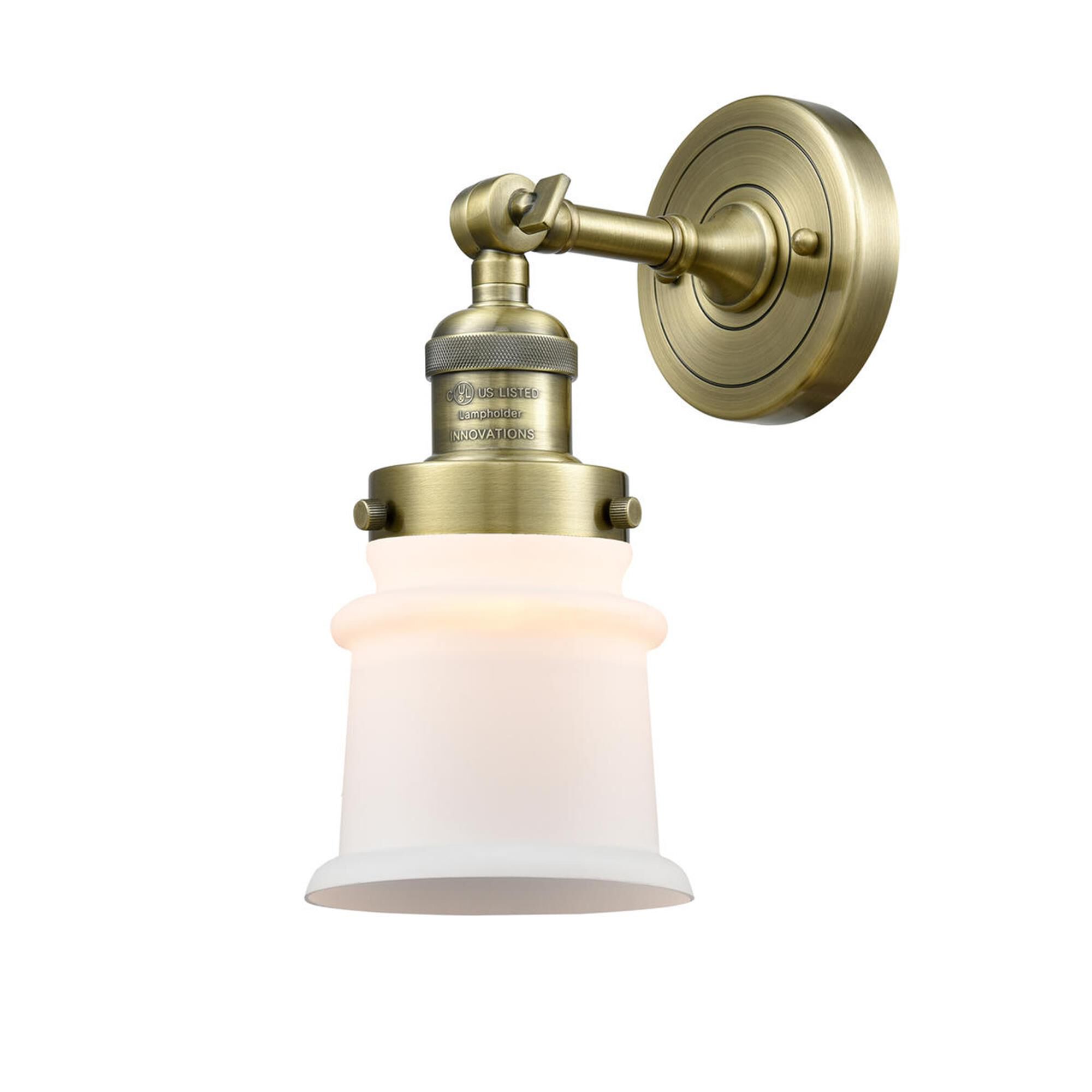 Shown in Antique Brass finish and Frosted glass