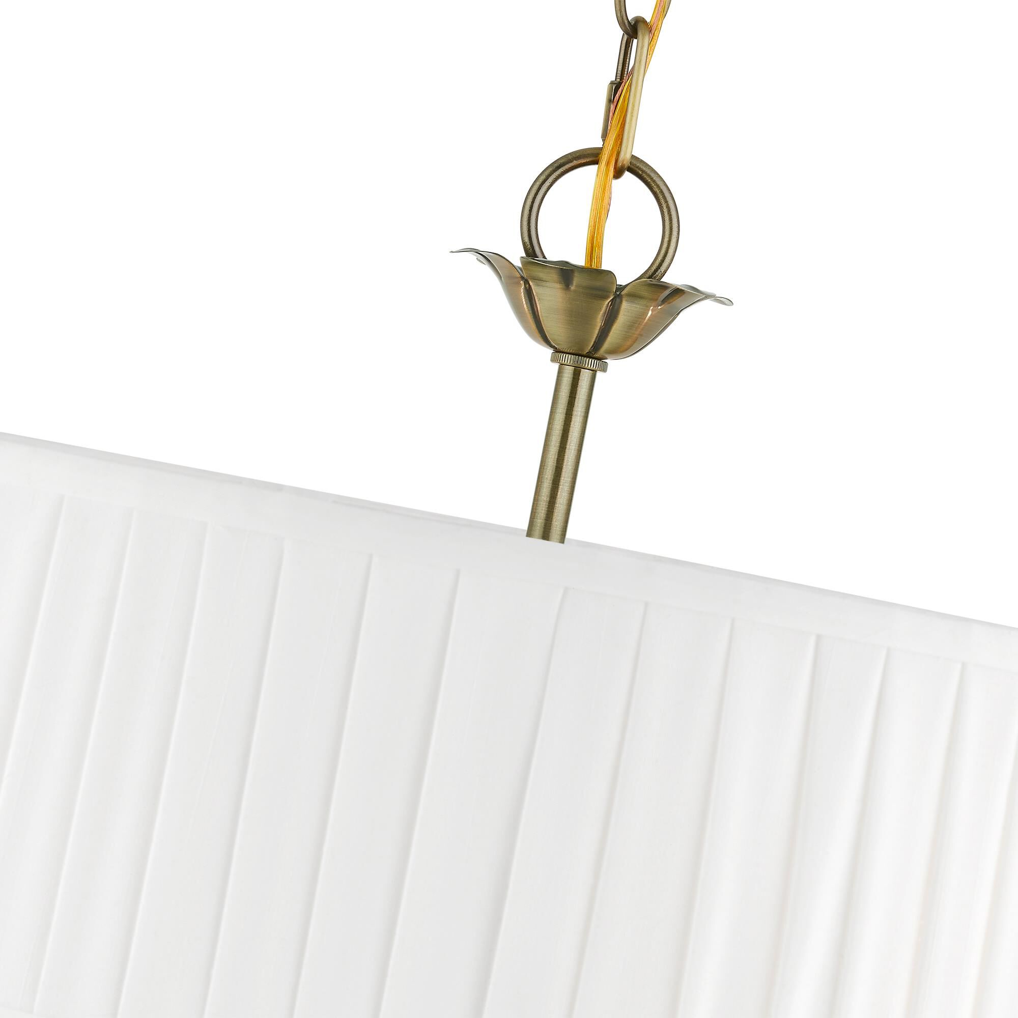 Shown in Antique Brass finish and Off-White Fabric Hardback with White Fabric Inside shade
