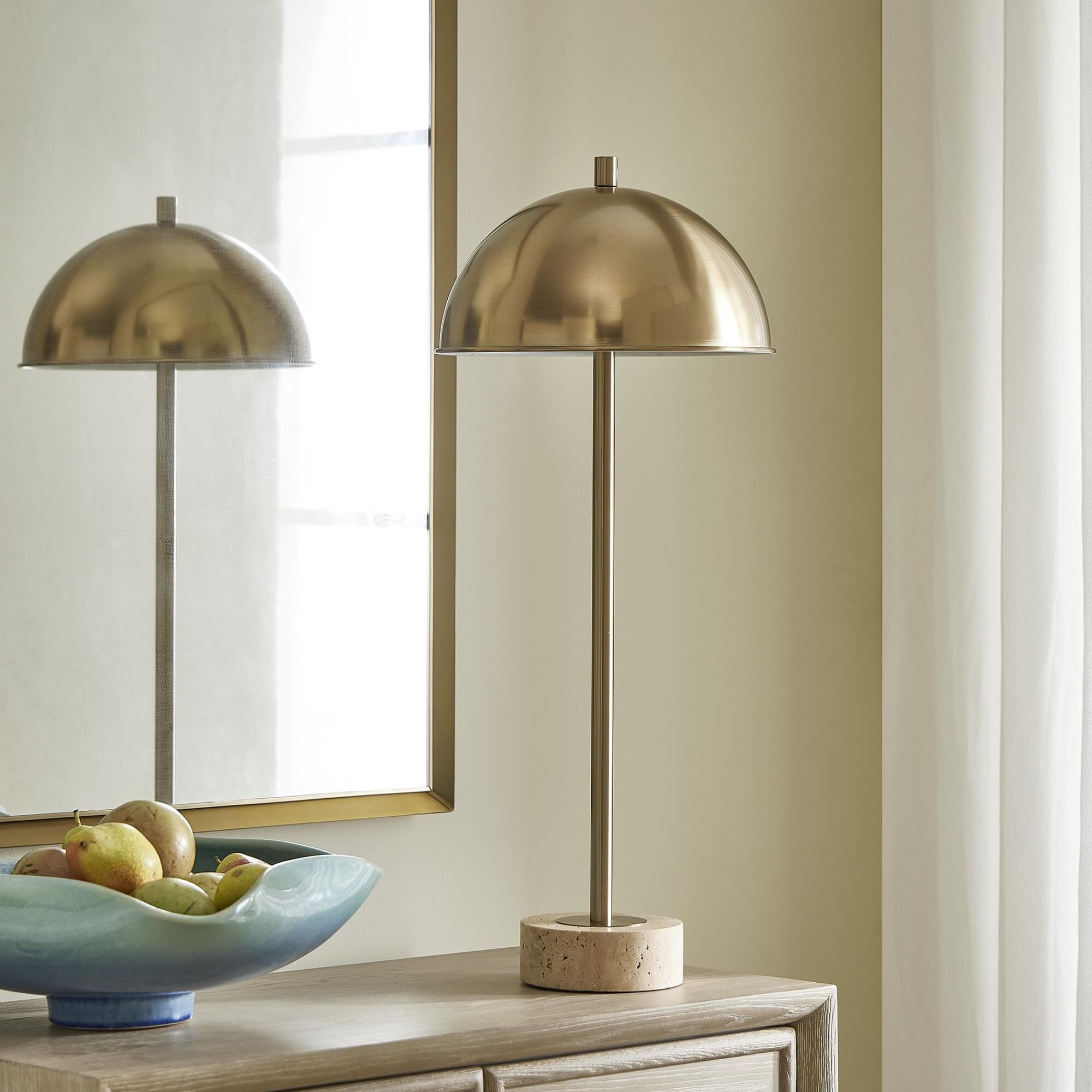 Shown in Brass and Gold finish and Round shade