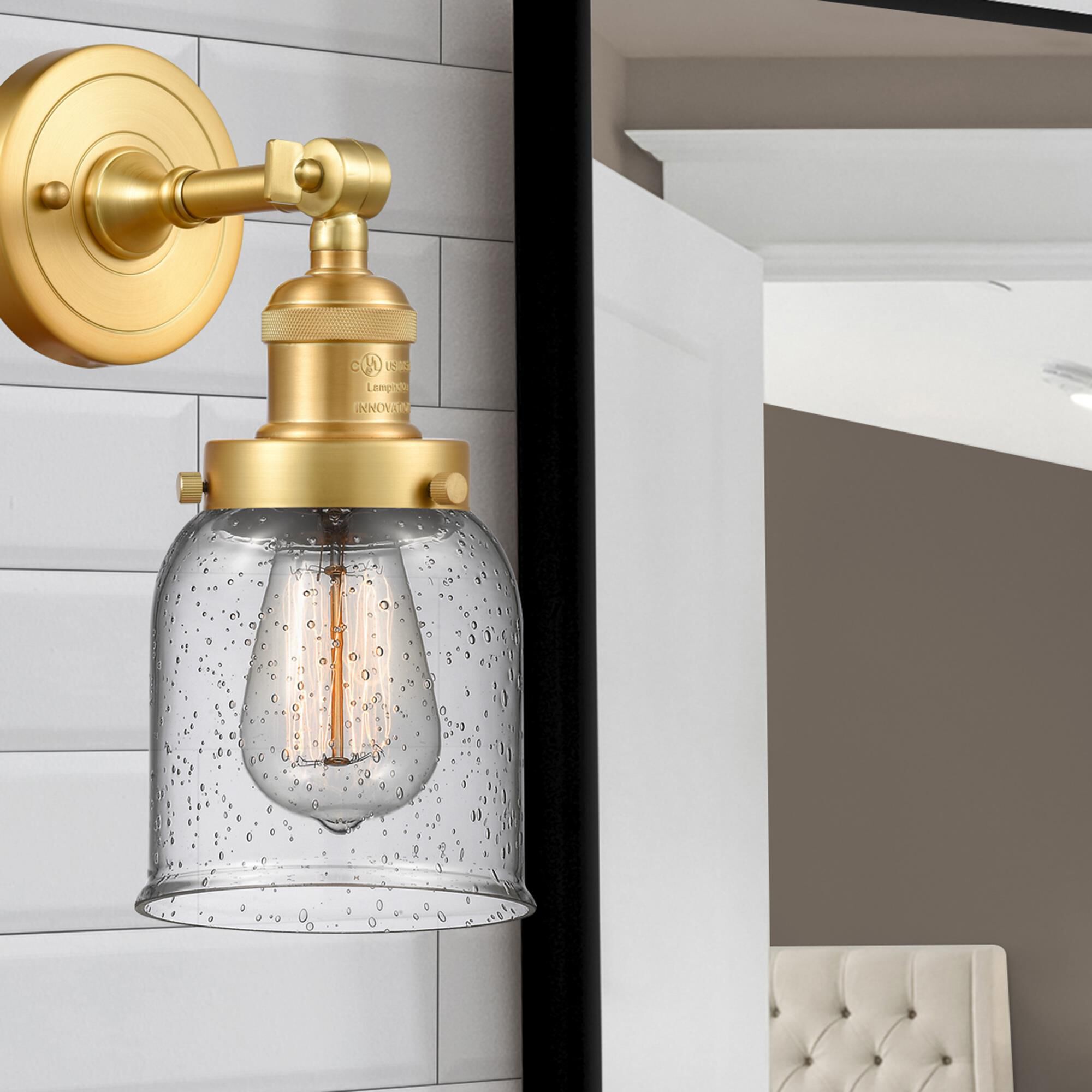 Shown in Satin Gold finish and Seedy Small Bell glass