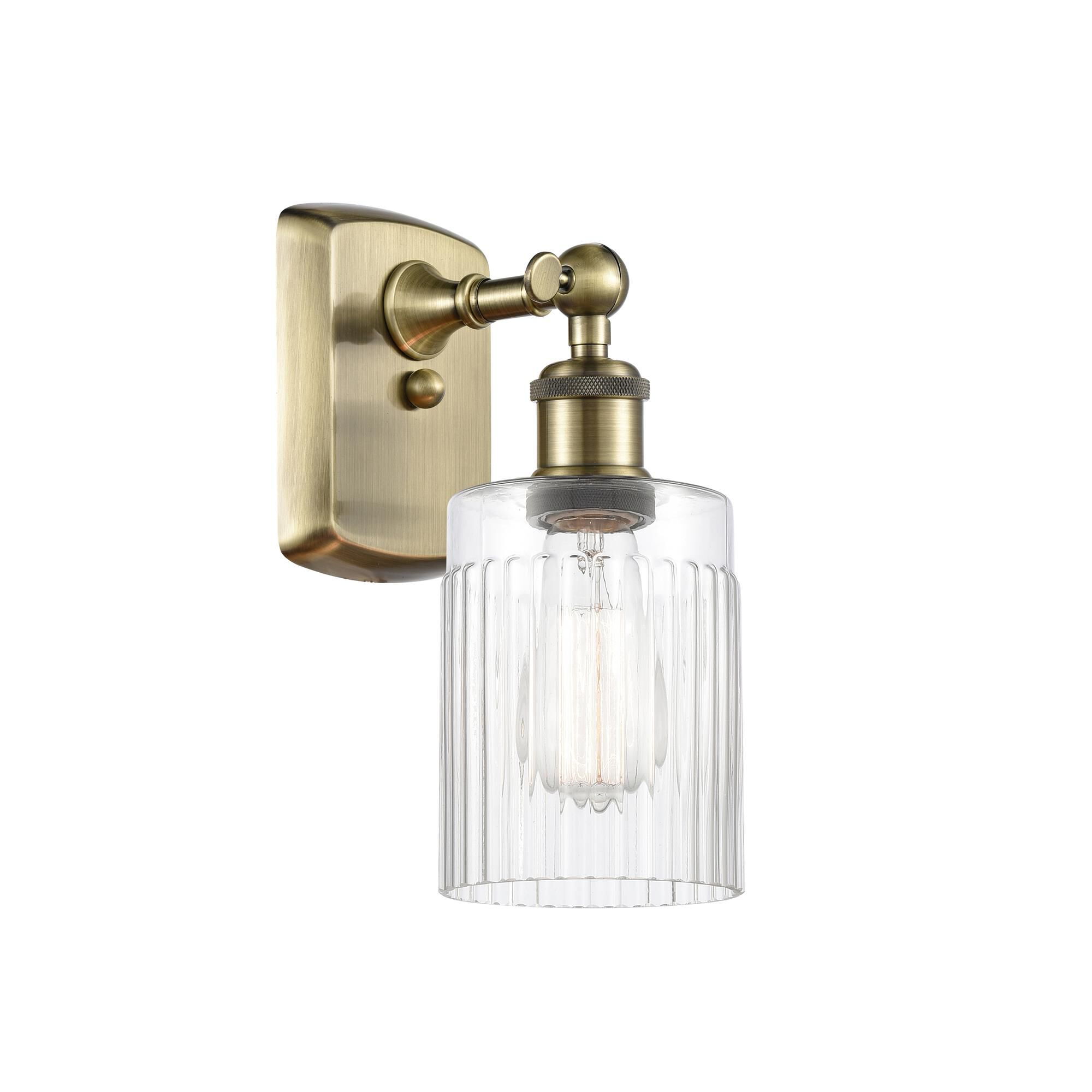 Shown in Antique Brass finish and Clear Hadley glass and None shade