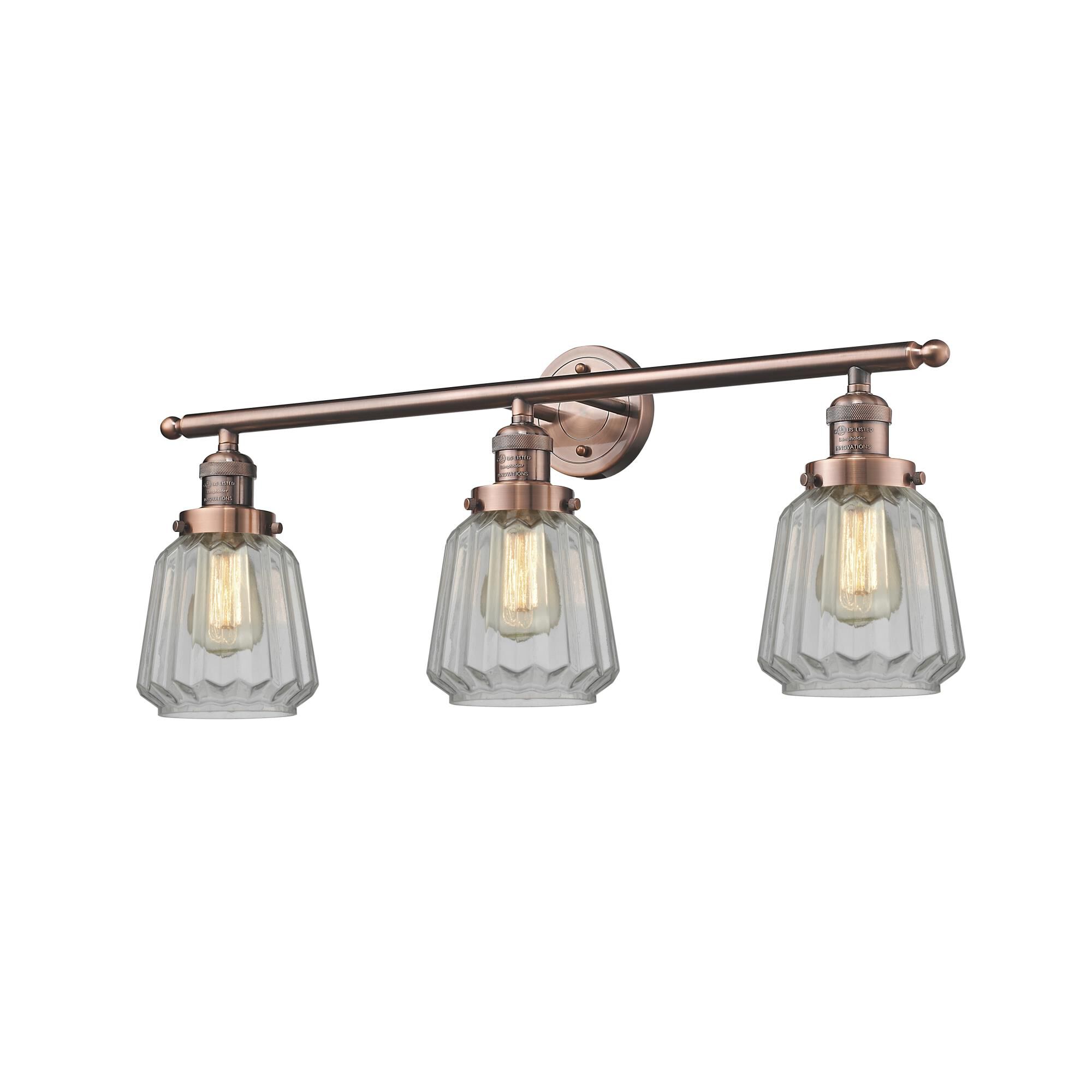 Shown in Antique Copper finish and Clear Fluted glass