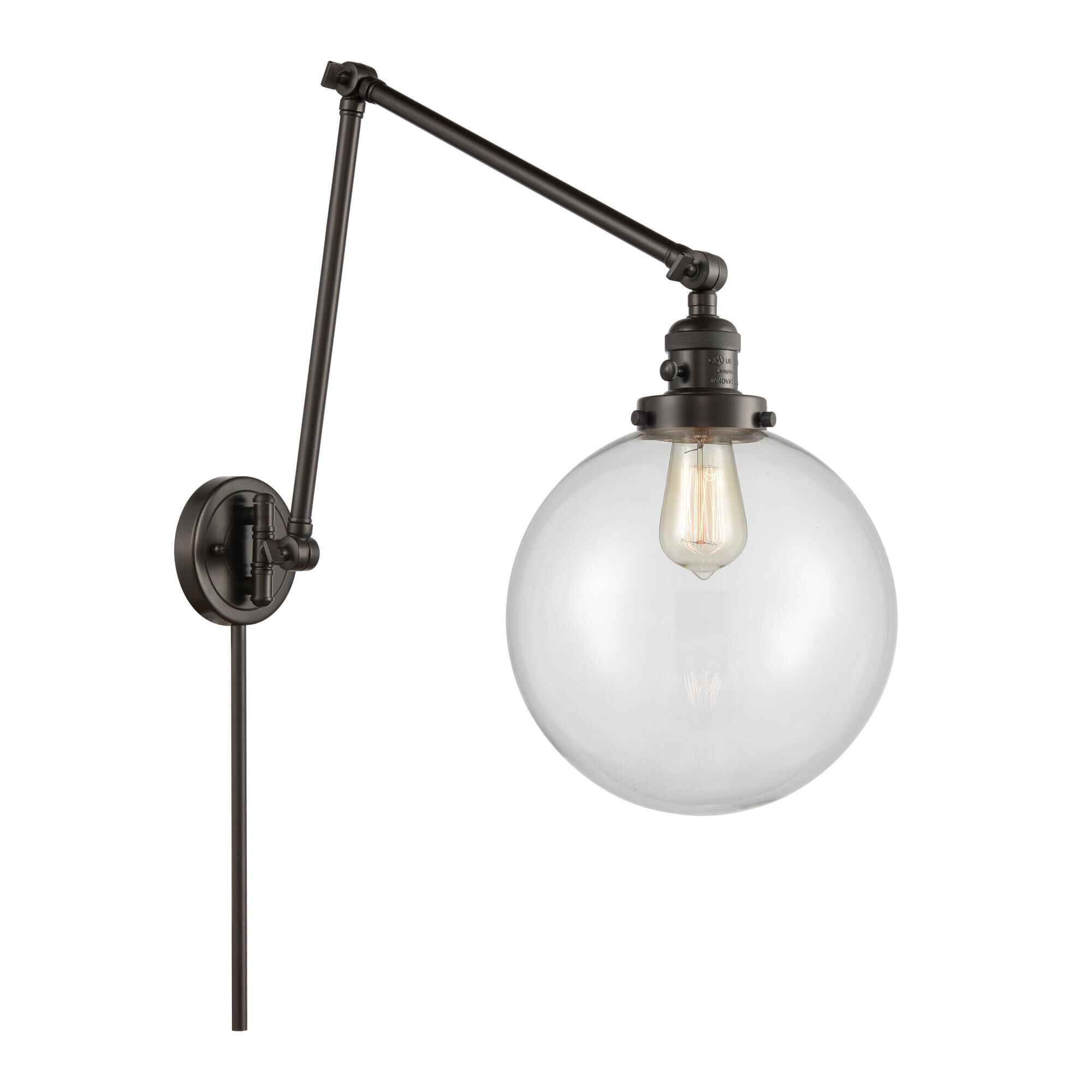 Shown in Oil Rubbed Bronze finish and Clear Beacon glass