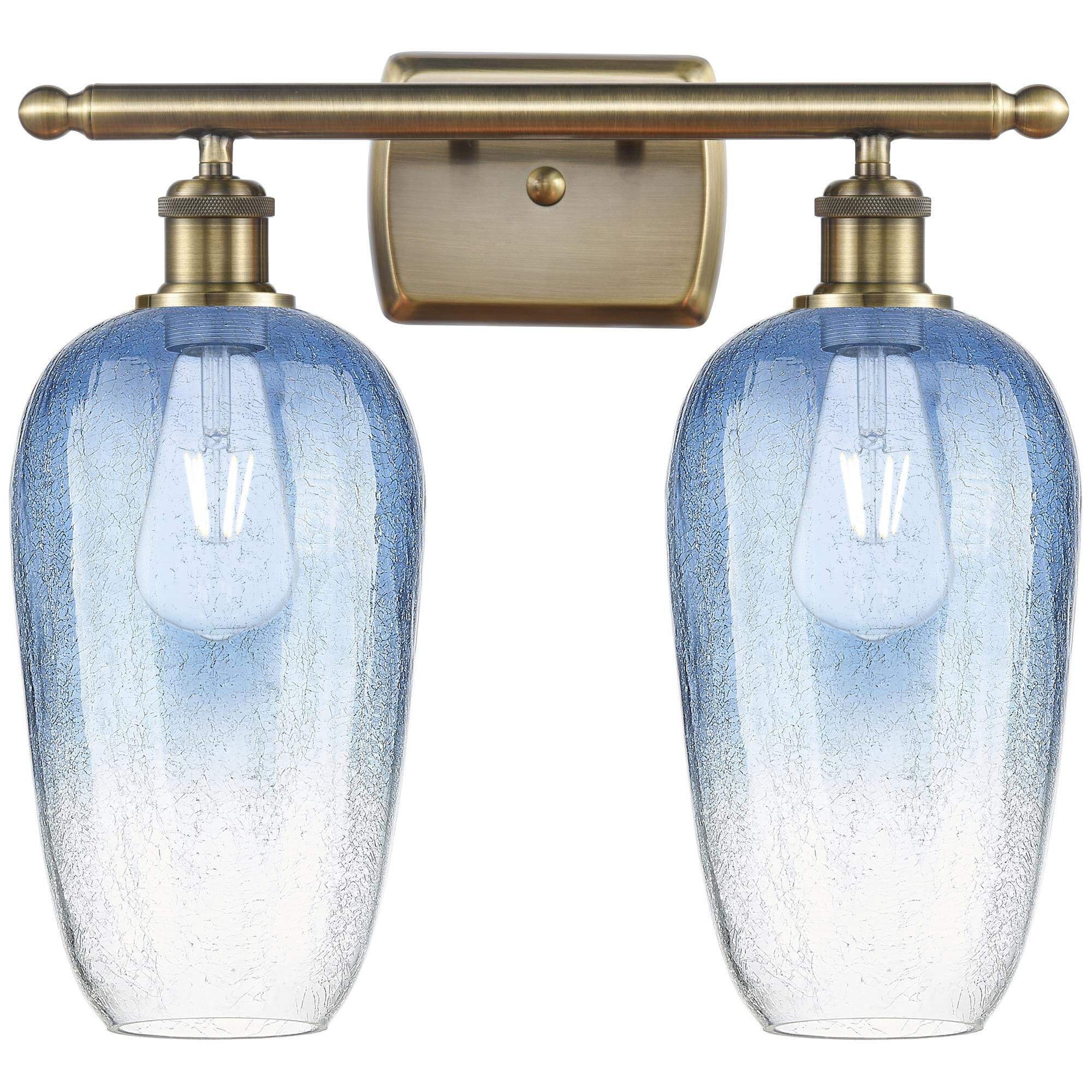 Shown in Antique Brass finish and Sapphire Blue glass