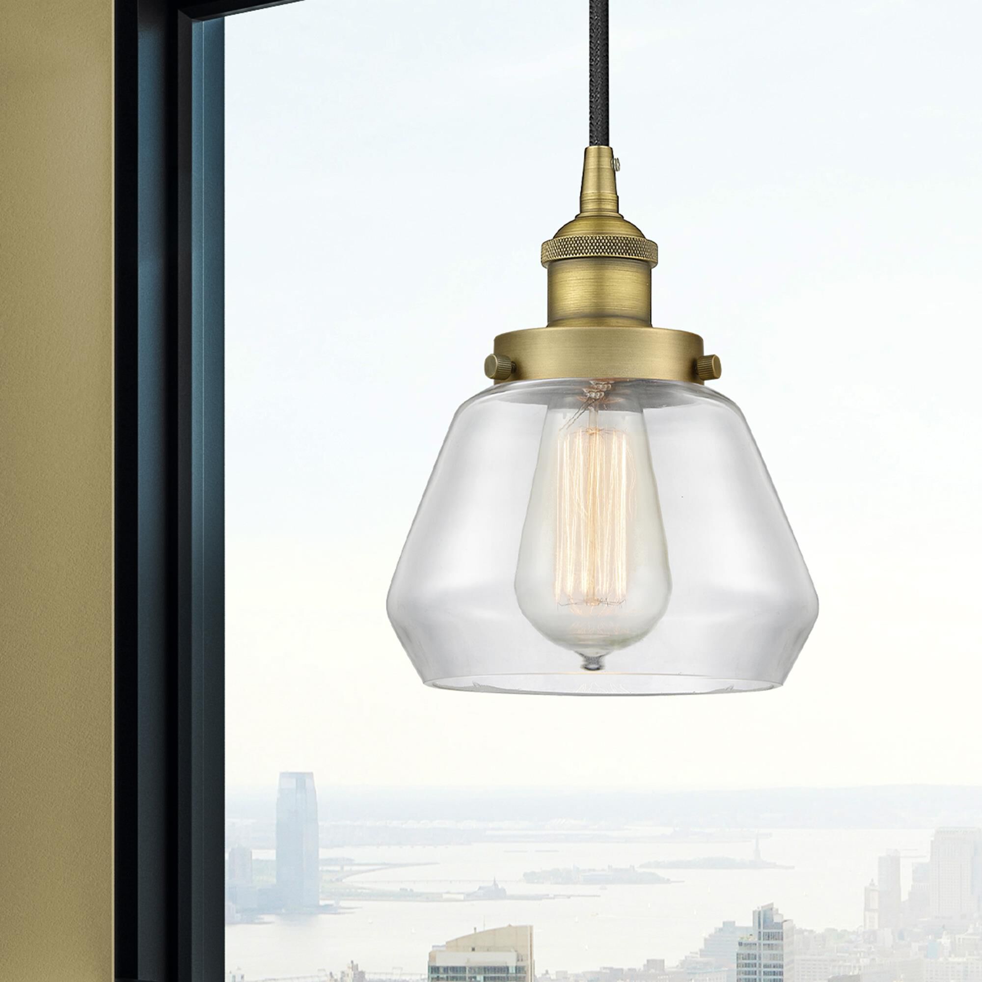 Shown in Brushed Brass finish and Clear glass