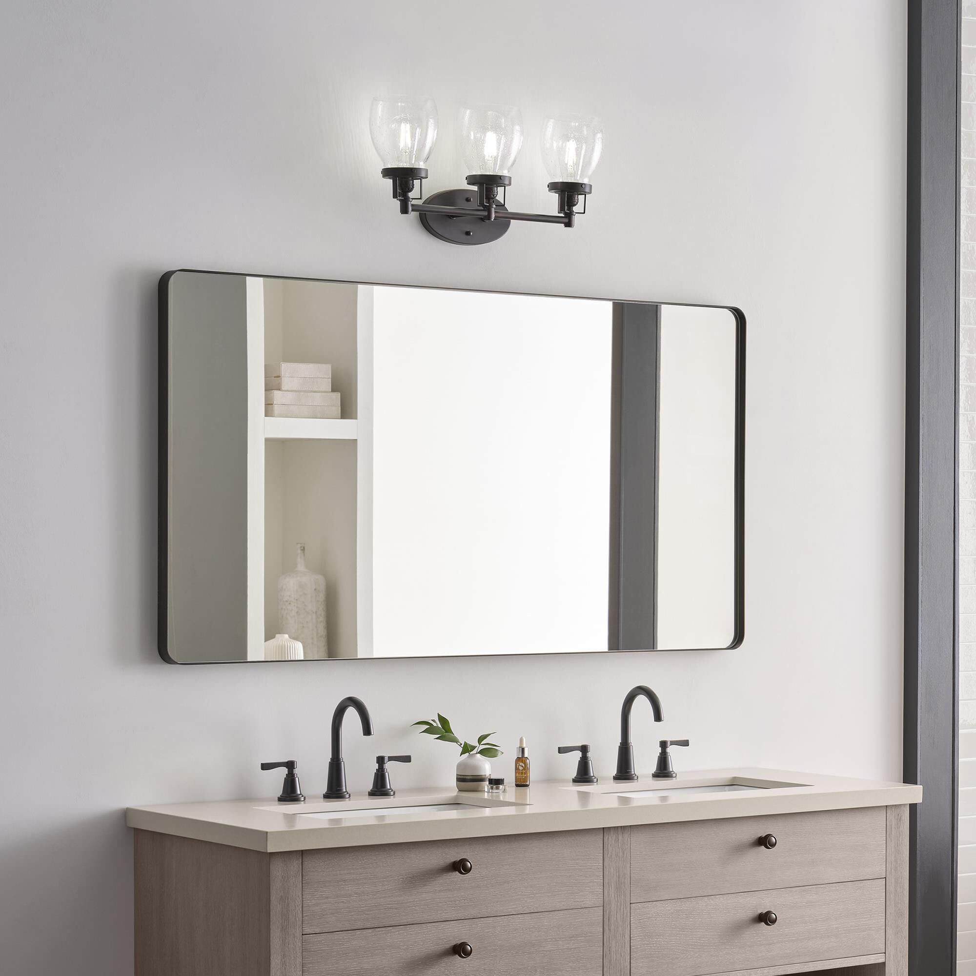 Shown in Bronze finish and Clear Seeded glass