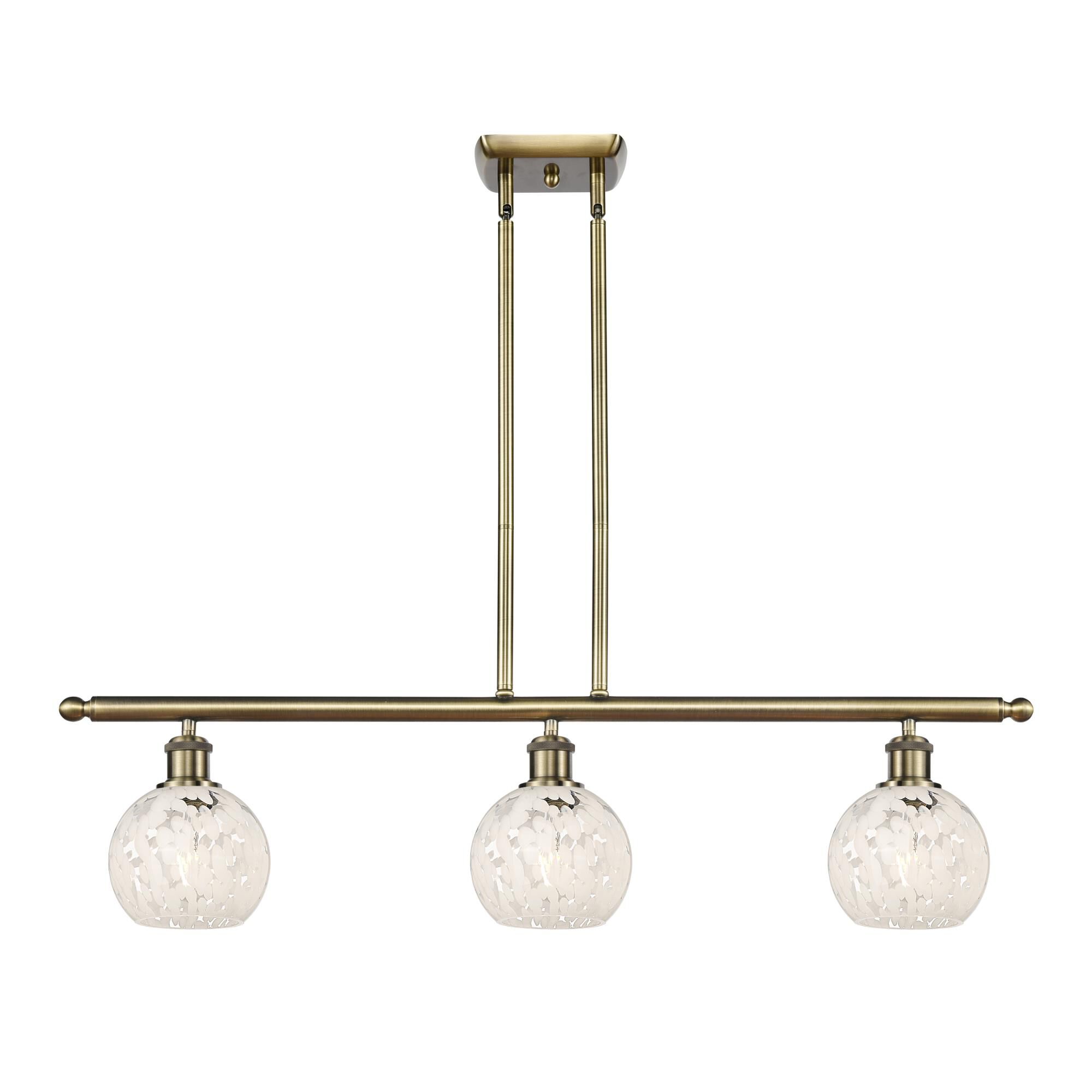 Shown in Antique Brass finish and White Mouchette glass