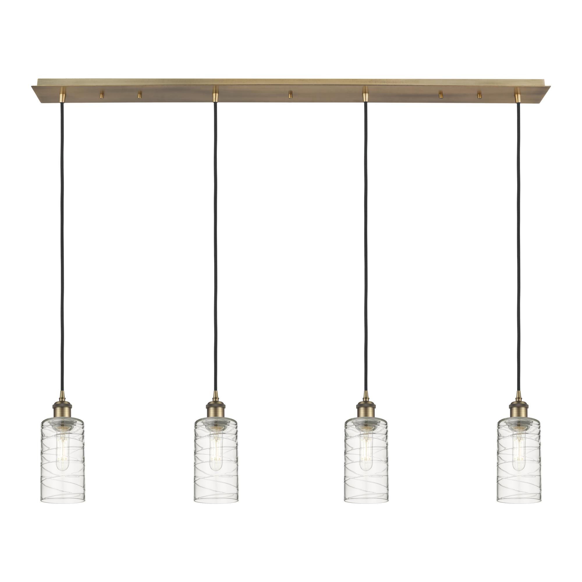 Shown in Brushed Brass finish and Deco Swirl shade