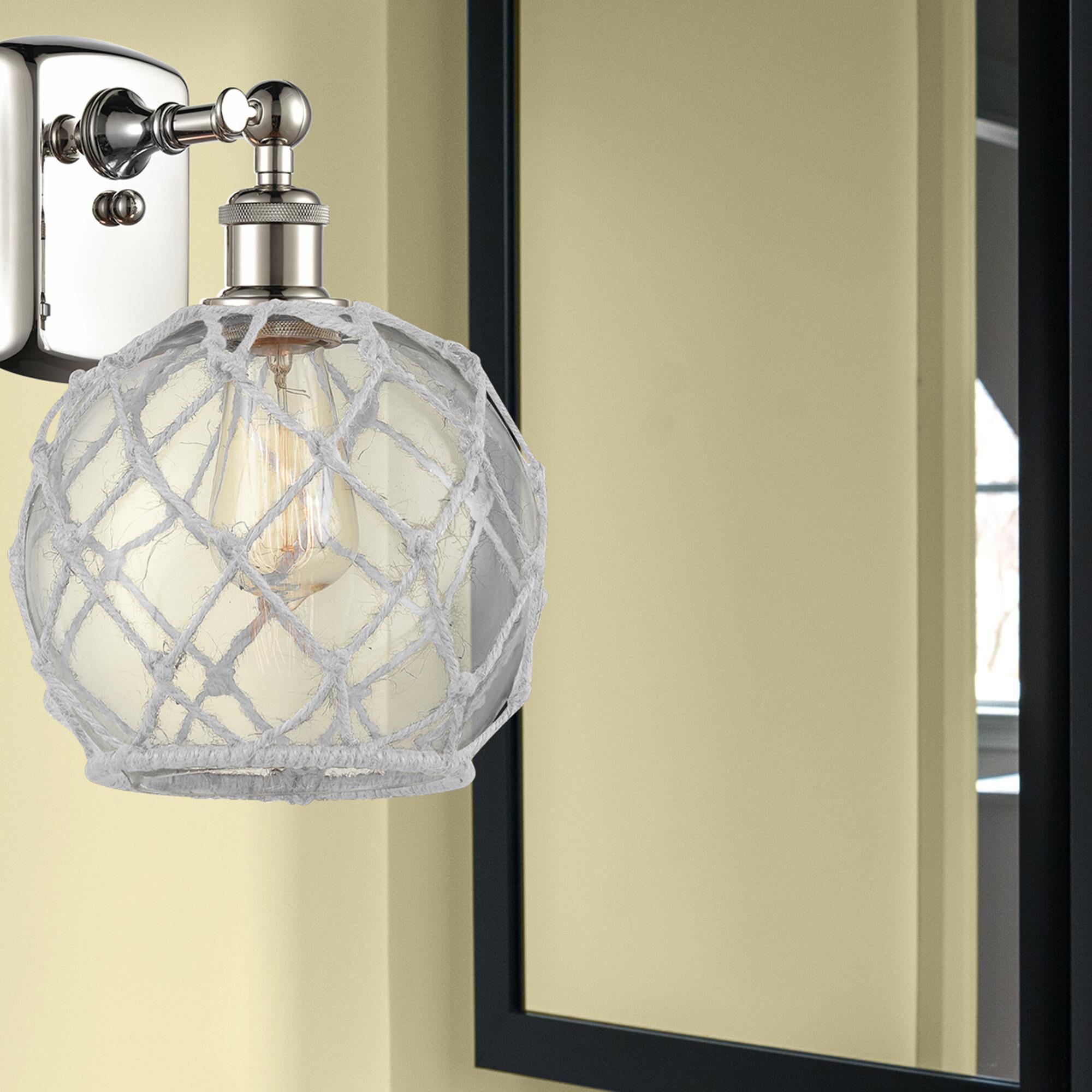 Shown in Polished Nickel finish and Sphere glass and Glass And Rope shade