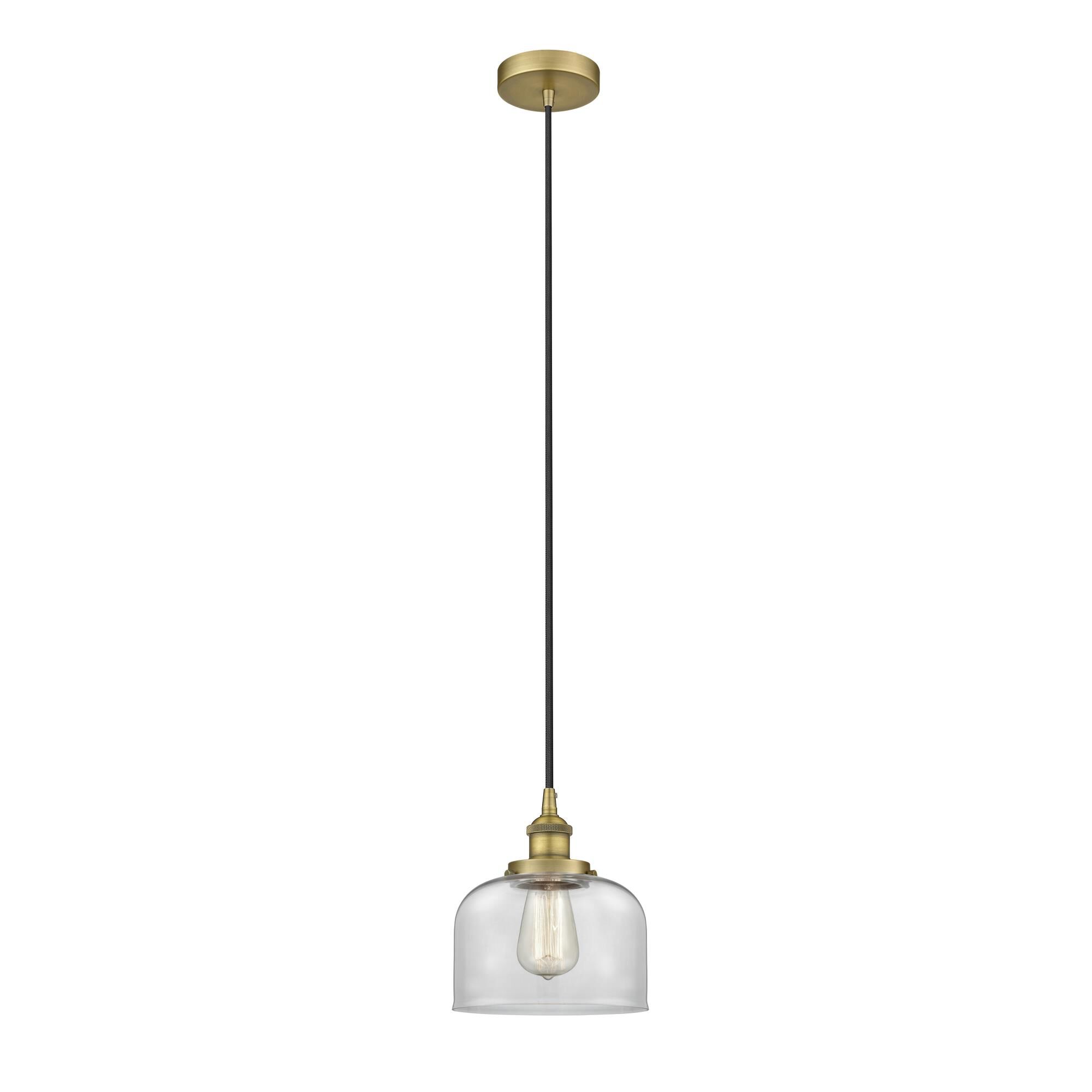 Shown in Brushed Brass finish and Clear Large Bell glass