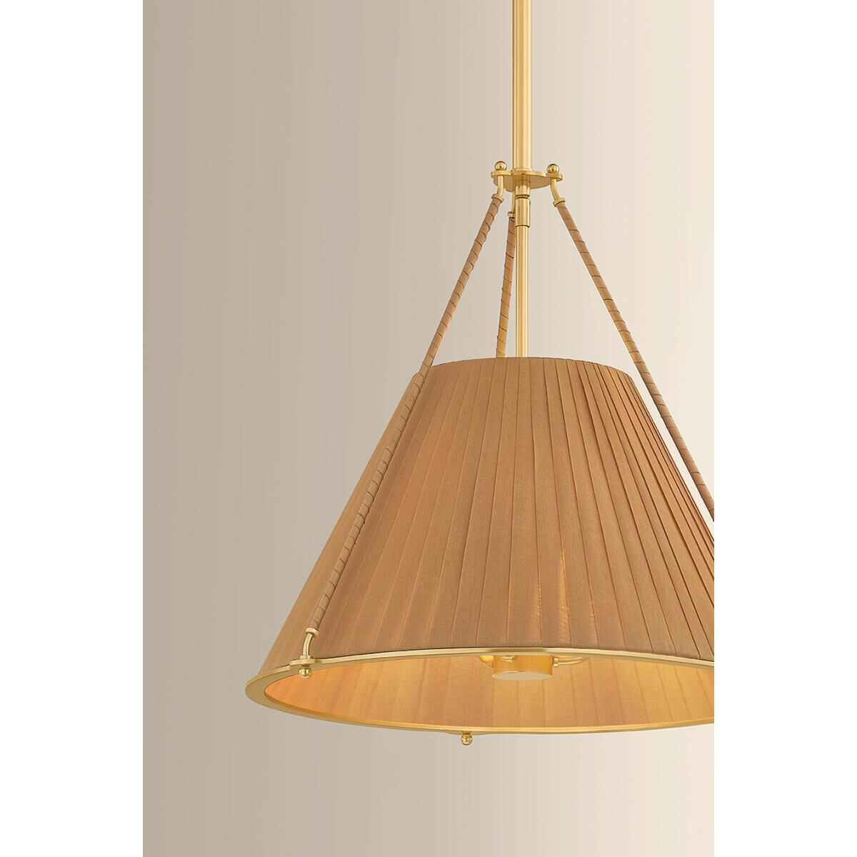 Shown in Aged Brass finish and Garnet Linen shade