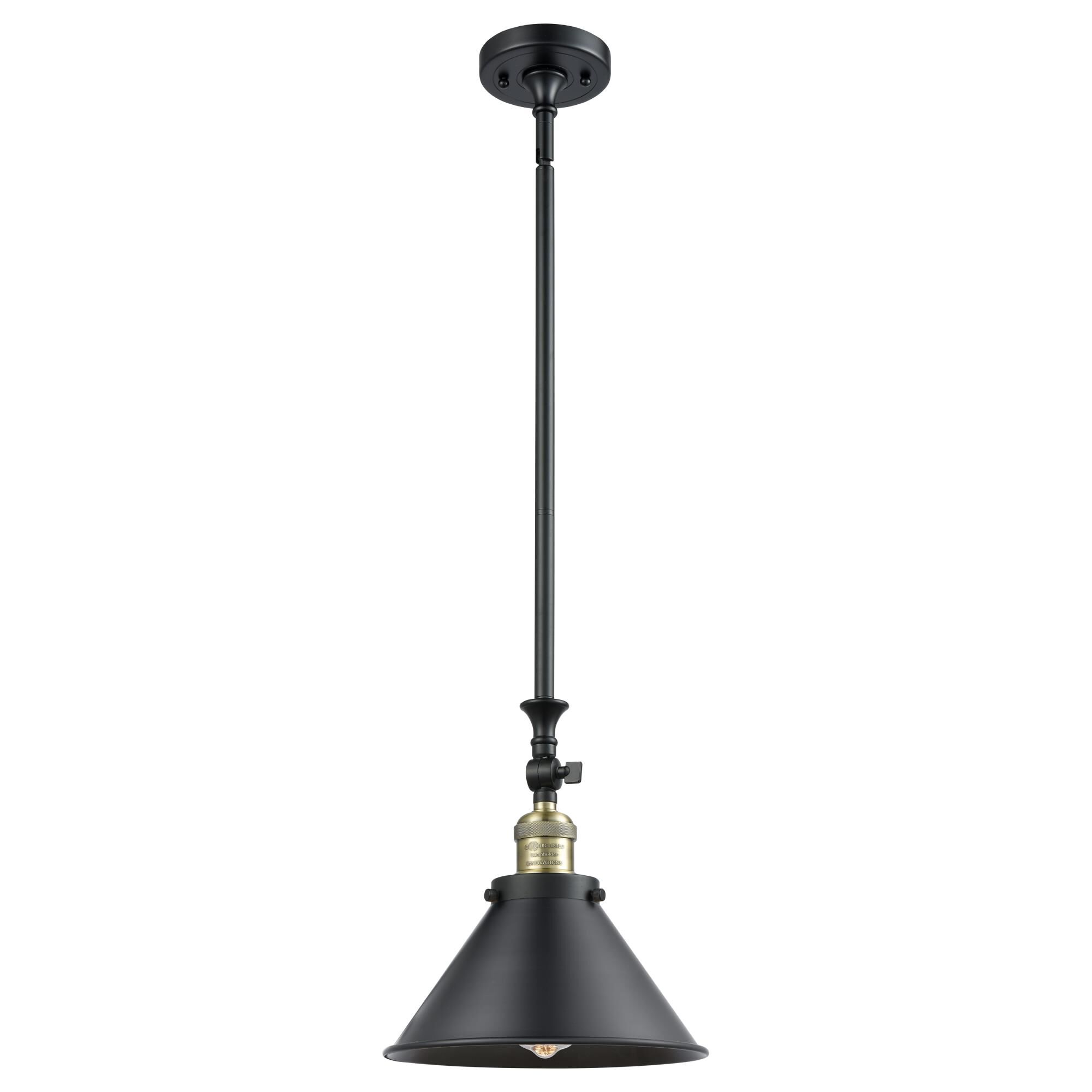 Shown in Black Antique Brass finish and Matte Black shade