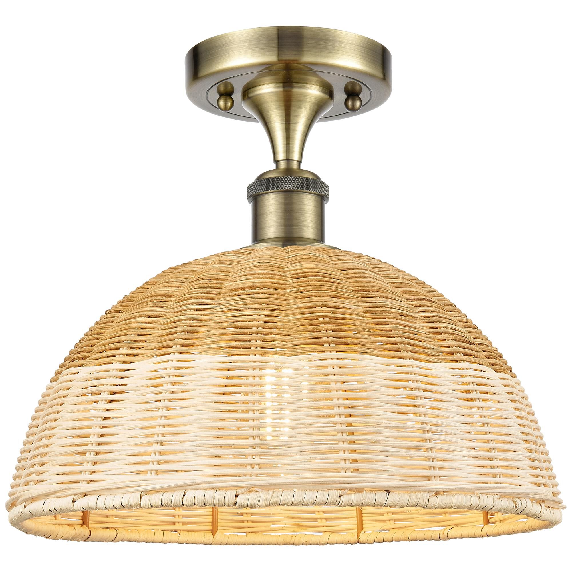 Shown in Antique Brass finish and Natural shade