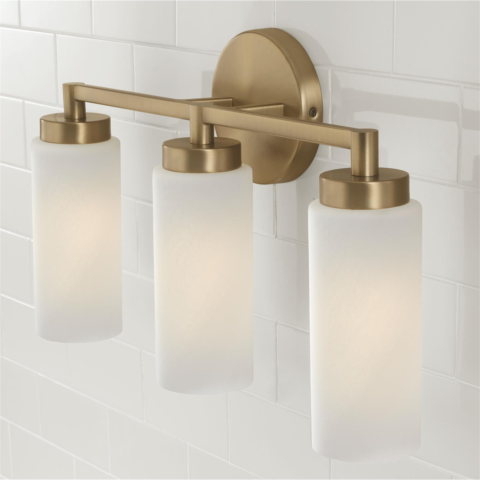 Shown in Aged Brass finish and Faux Alabaster glass