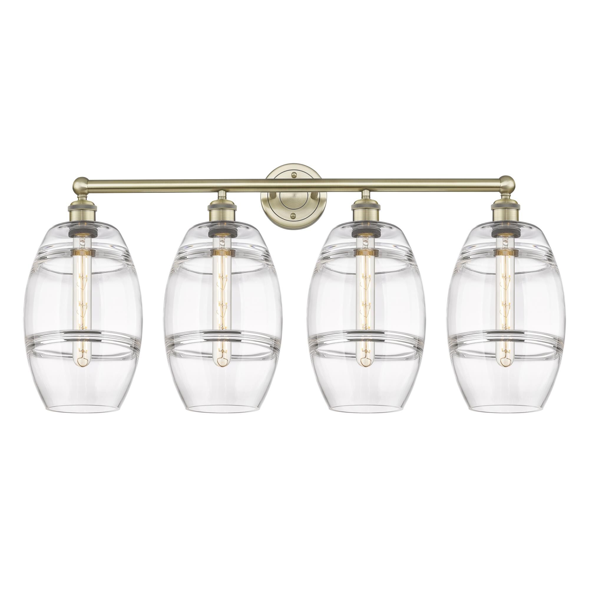 Shown in Antique Brass finish and Clear glass