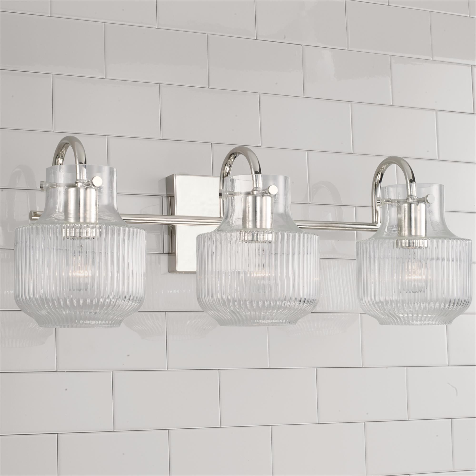 Shown in Polished Nickel finish and Clear Fluted glass