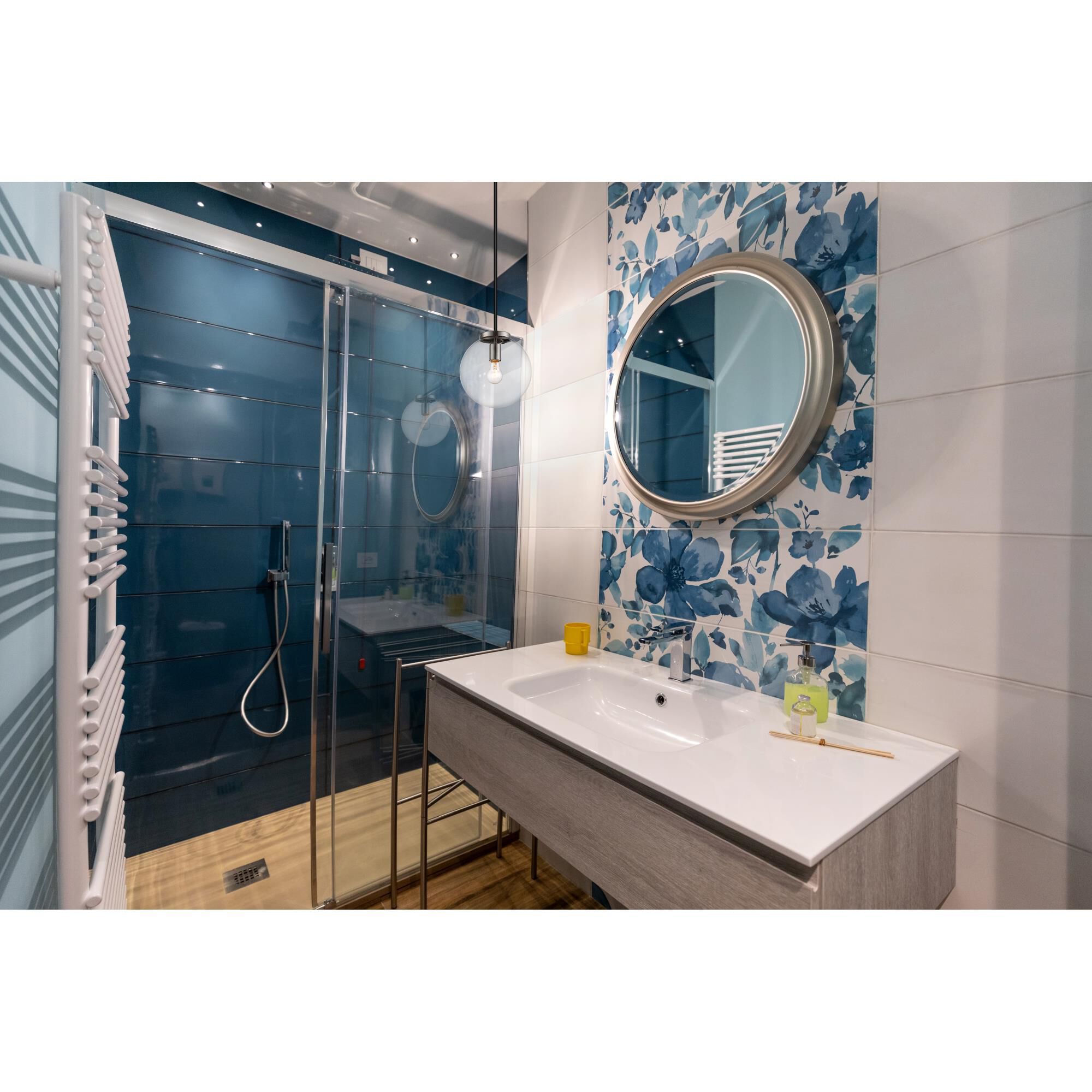 Shown in Matte Black + Brushed Nickel finish and Glass shade