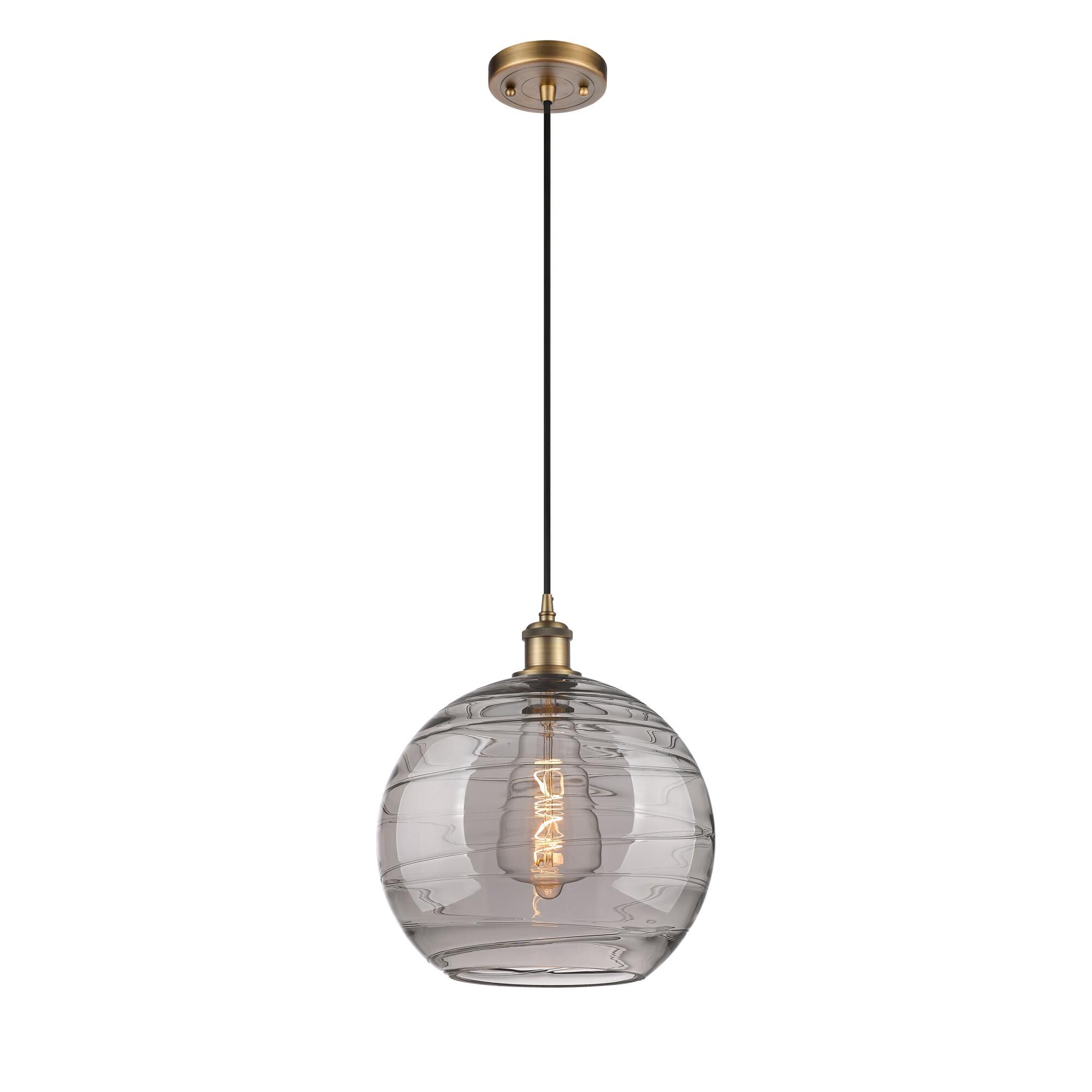 Shown in Brushed Brass finish and Light Smoke Deco Swirl glass