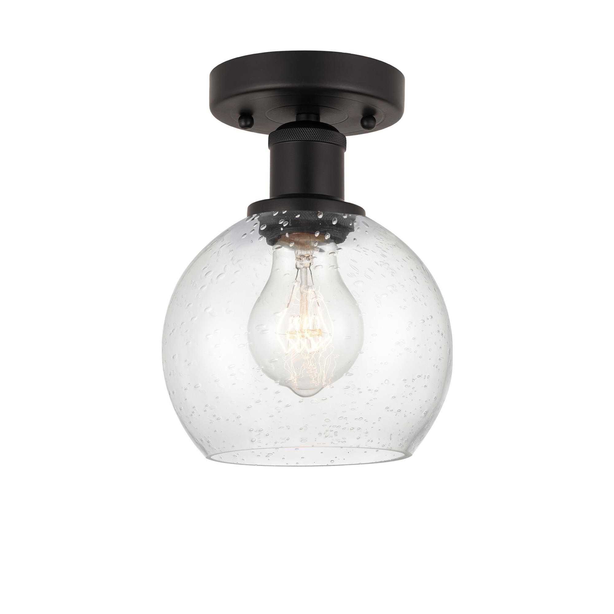 Shown in Oil Rubbed Bronze finish and Seedy glass