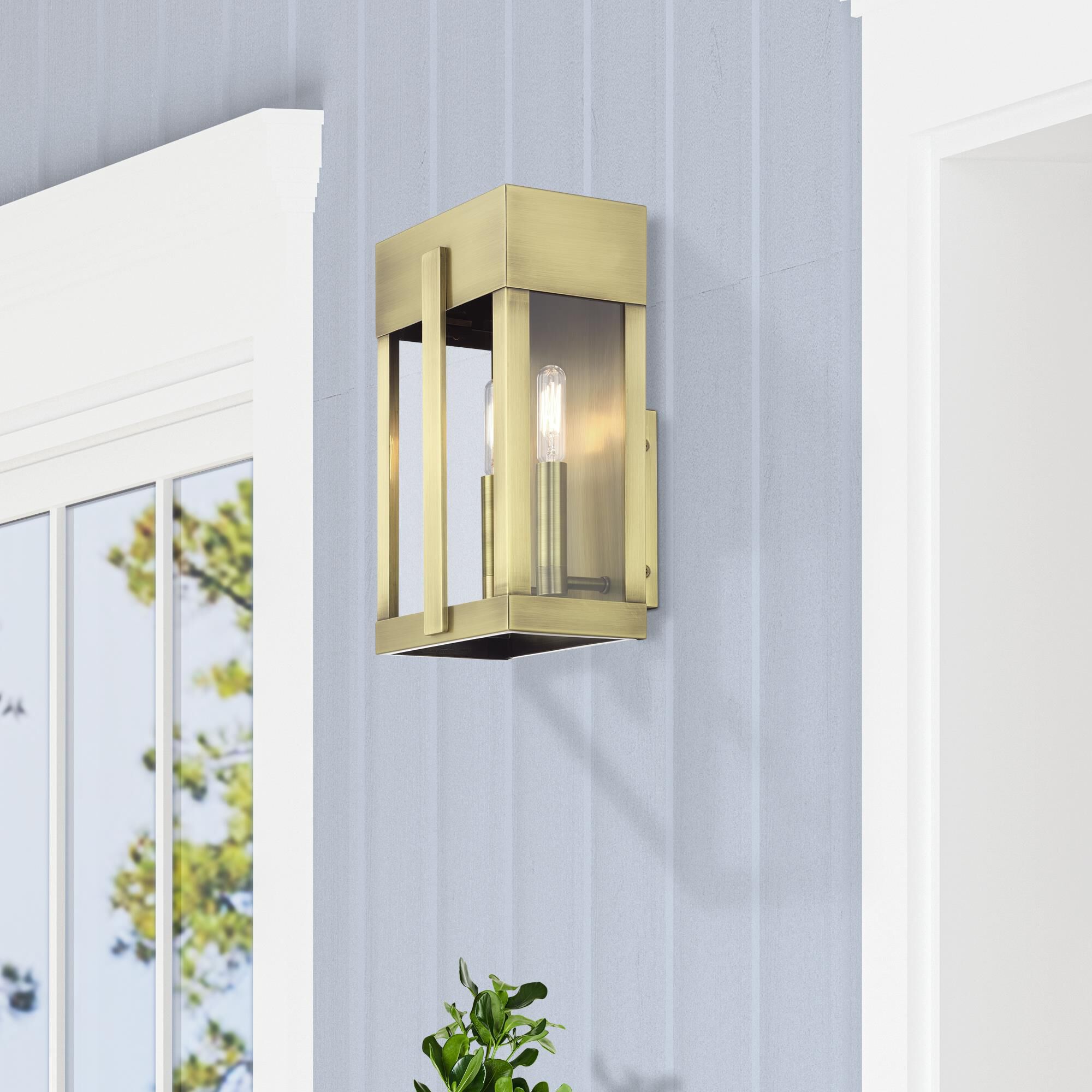 Shown in Antique Brass finish and Clear glass