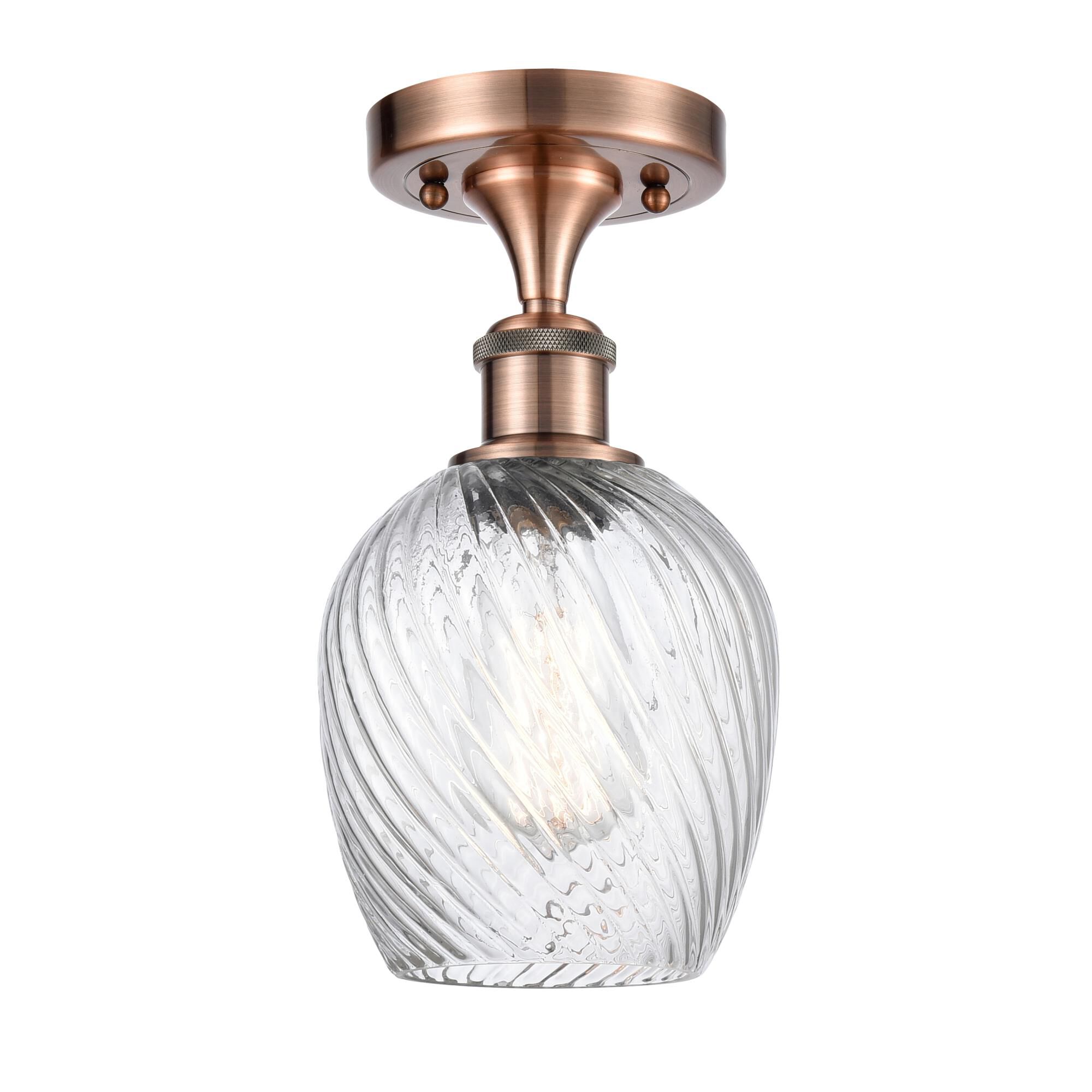Shown in Antique Copper finish and Globe glass and Glass shade
