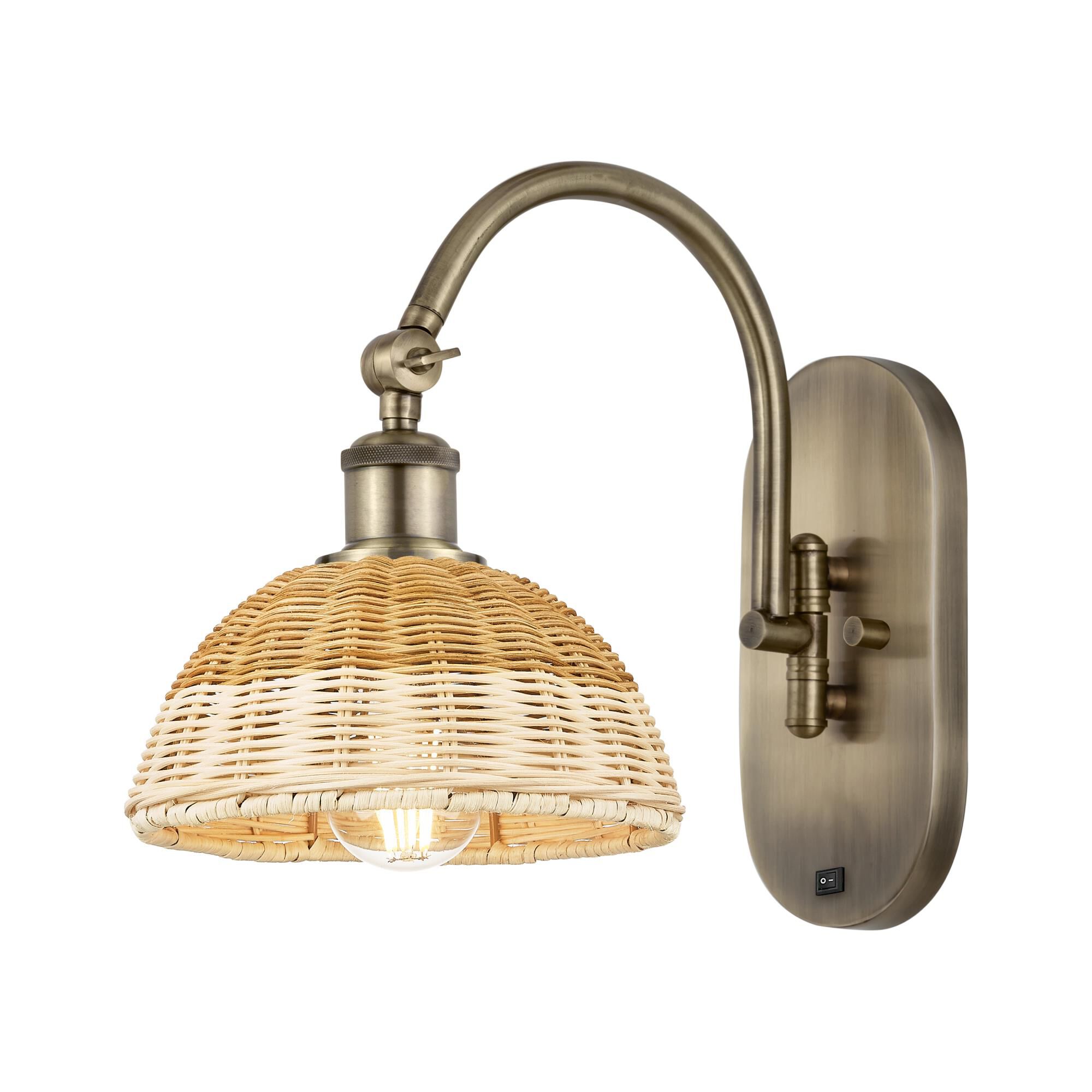Shown in Antique Brass finish and Natural shade