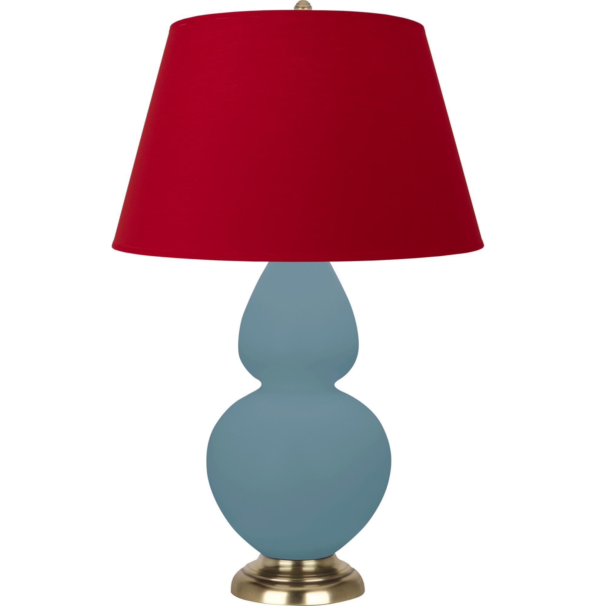 Shown in Matte Steel Blue finish and Black and Red shade and Antique Brass accent