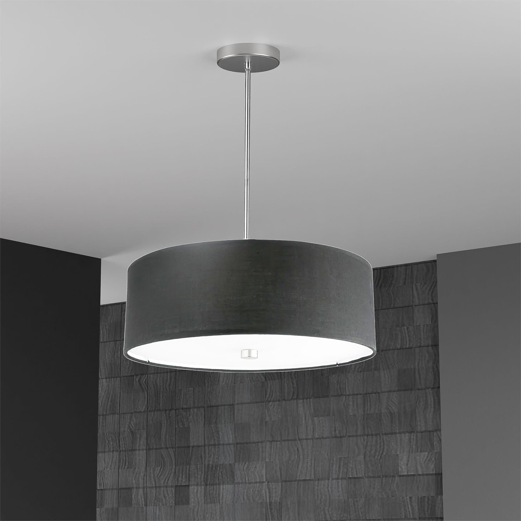 Shown in Black and Polished Chrome finish and Black Fabric Drum shade