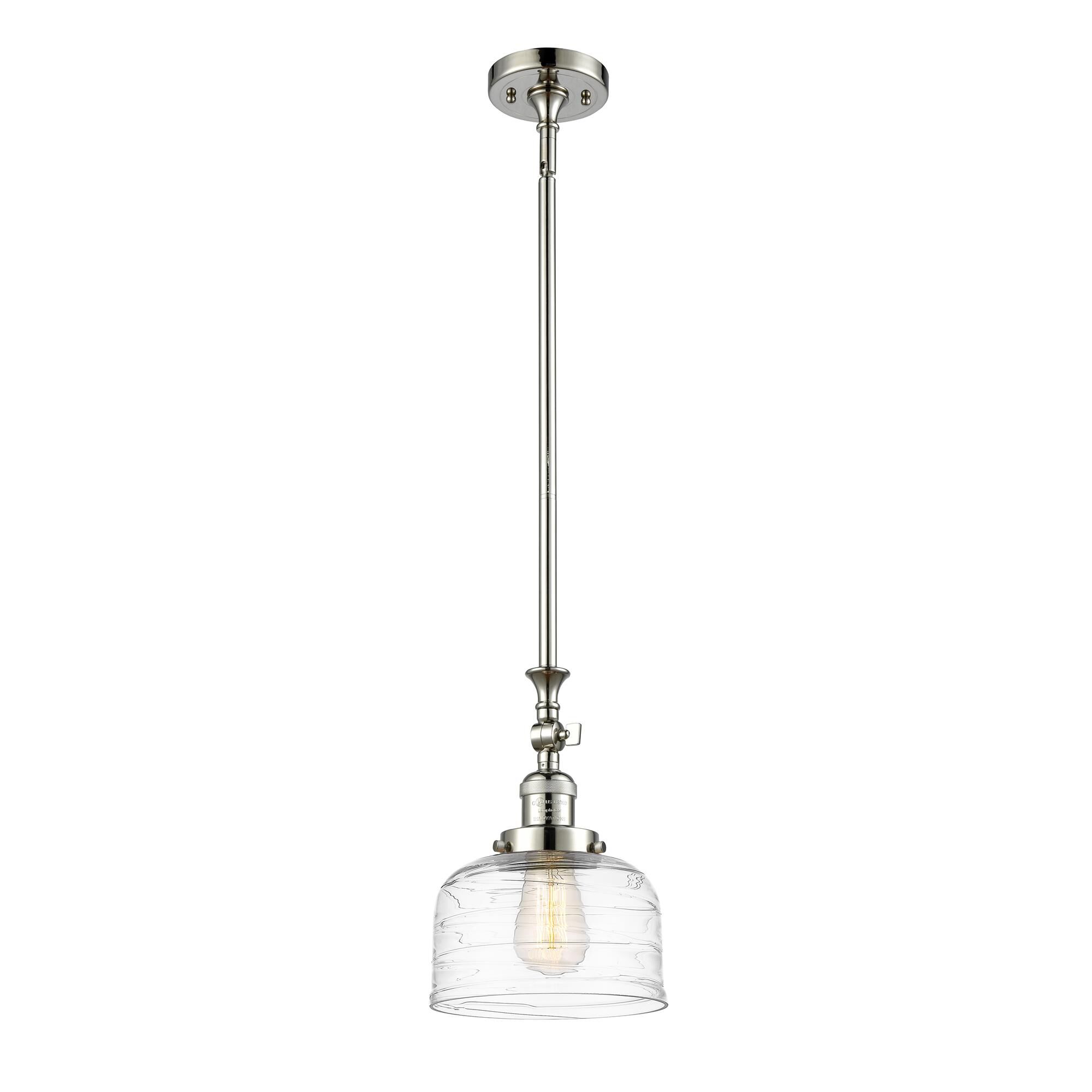 Shown in Polished Nickel finish and Clear Deco Swirl Large Bell glass