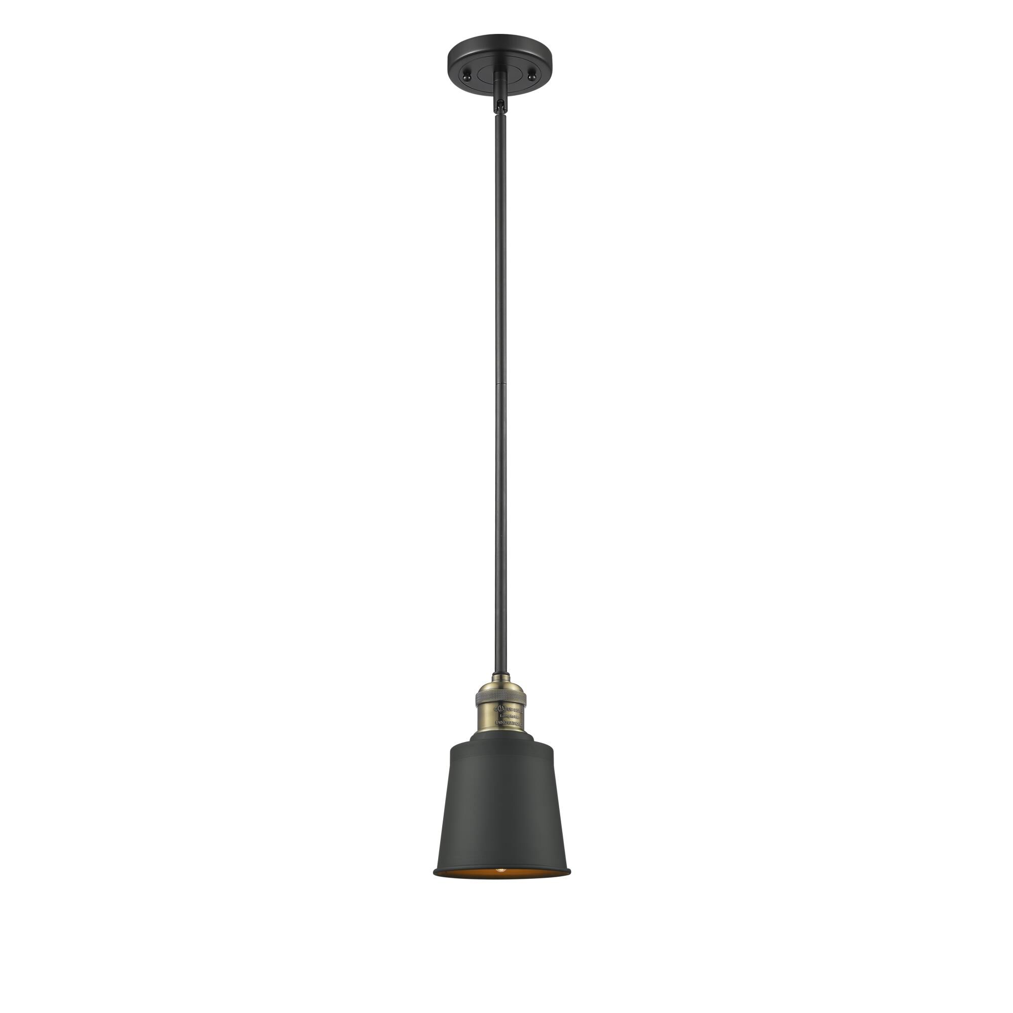 Shown in Black Antique Brass finish and Cone glass and Metal shade