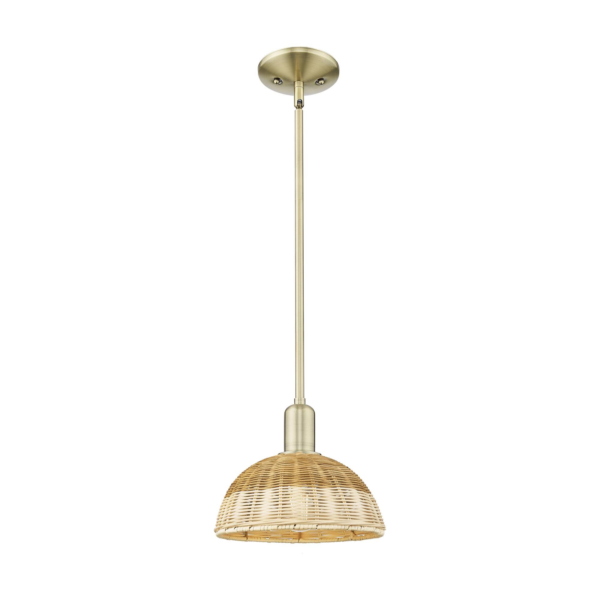 Shown in Antique Brass finish and Natural Fiber shade