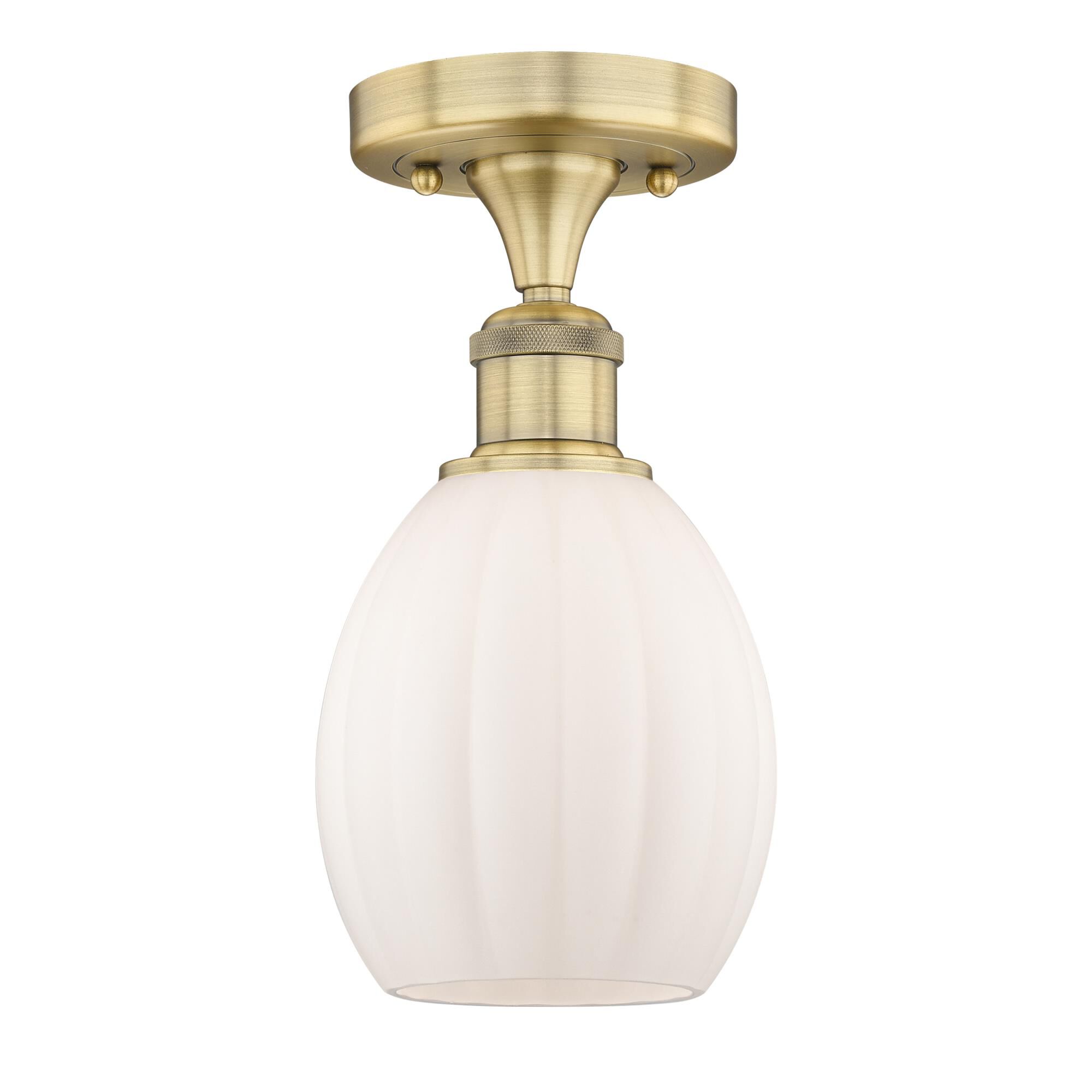 Shown in Brushed Brass finish and Matte White glass