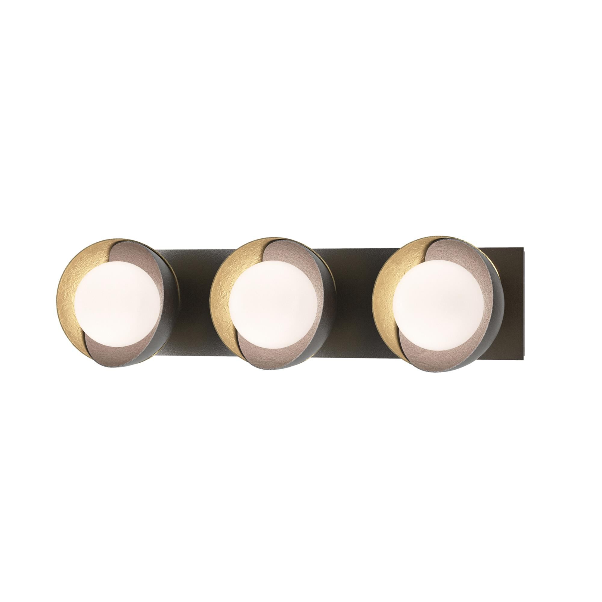 Shown in Oil Rubbed Bronze finish and Opal glass and Modern Brass (86) accent