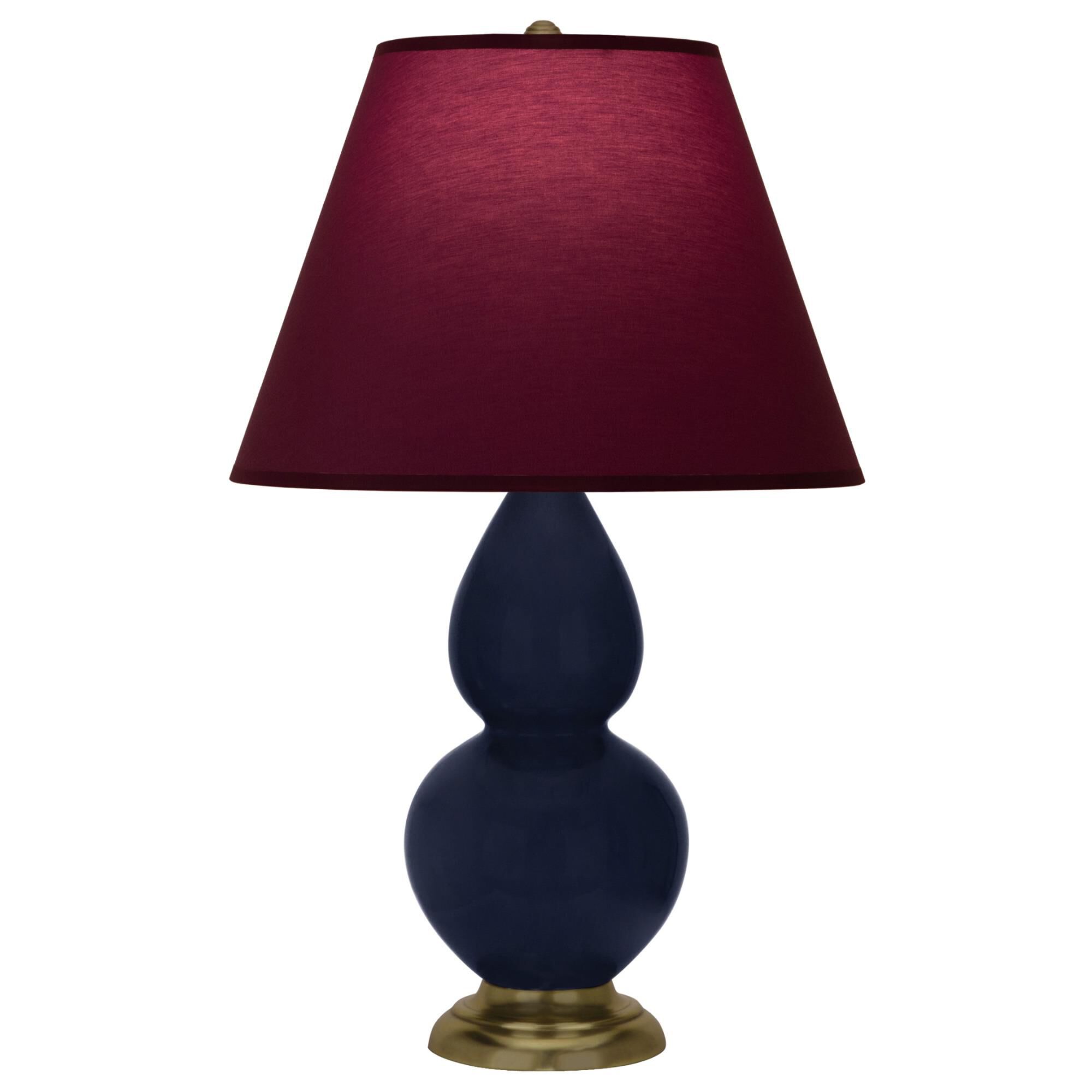 Shown in Midnight Blue finish and Plum and Lavender shade and Antique Brass accent