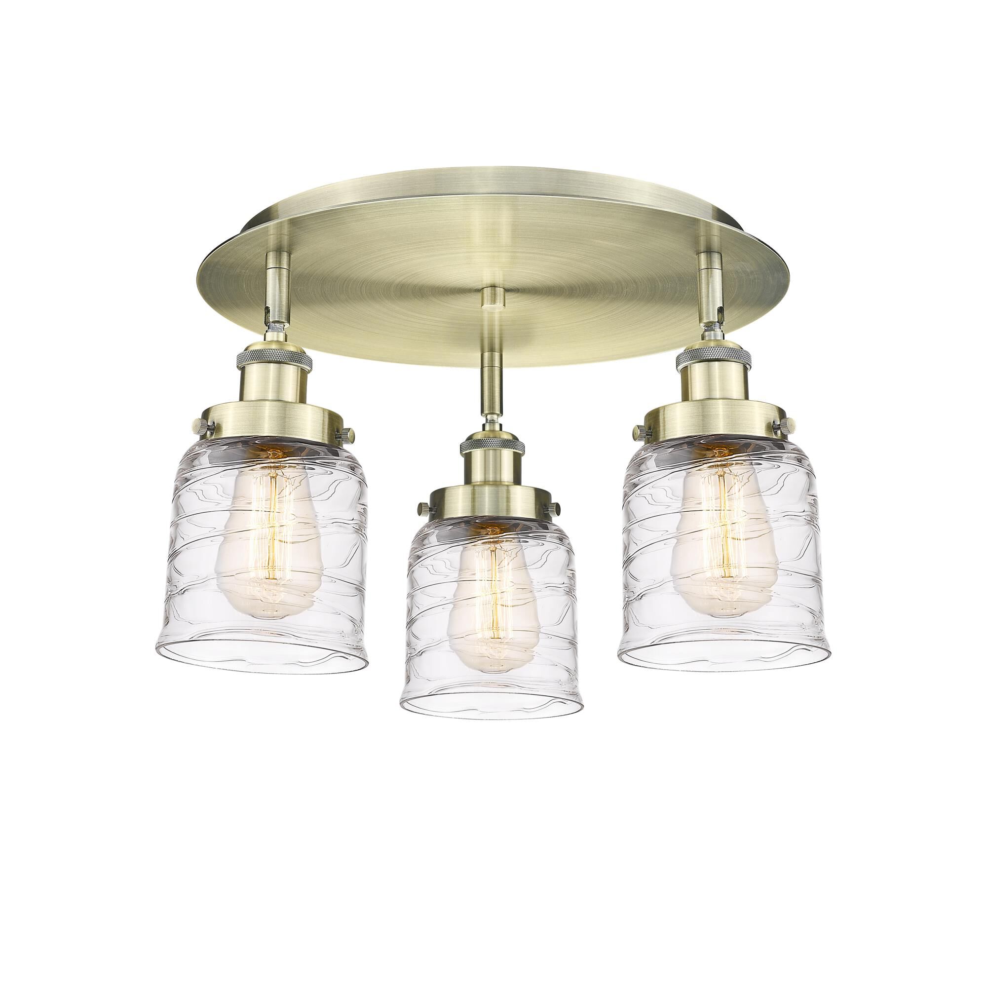 Shown in Antique Brass finish and Clear Deco Swirl glass