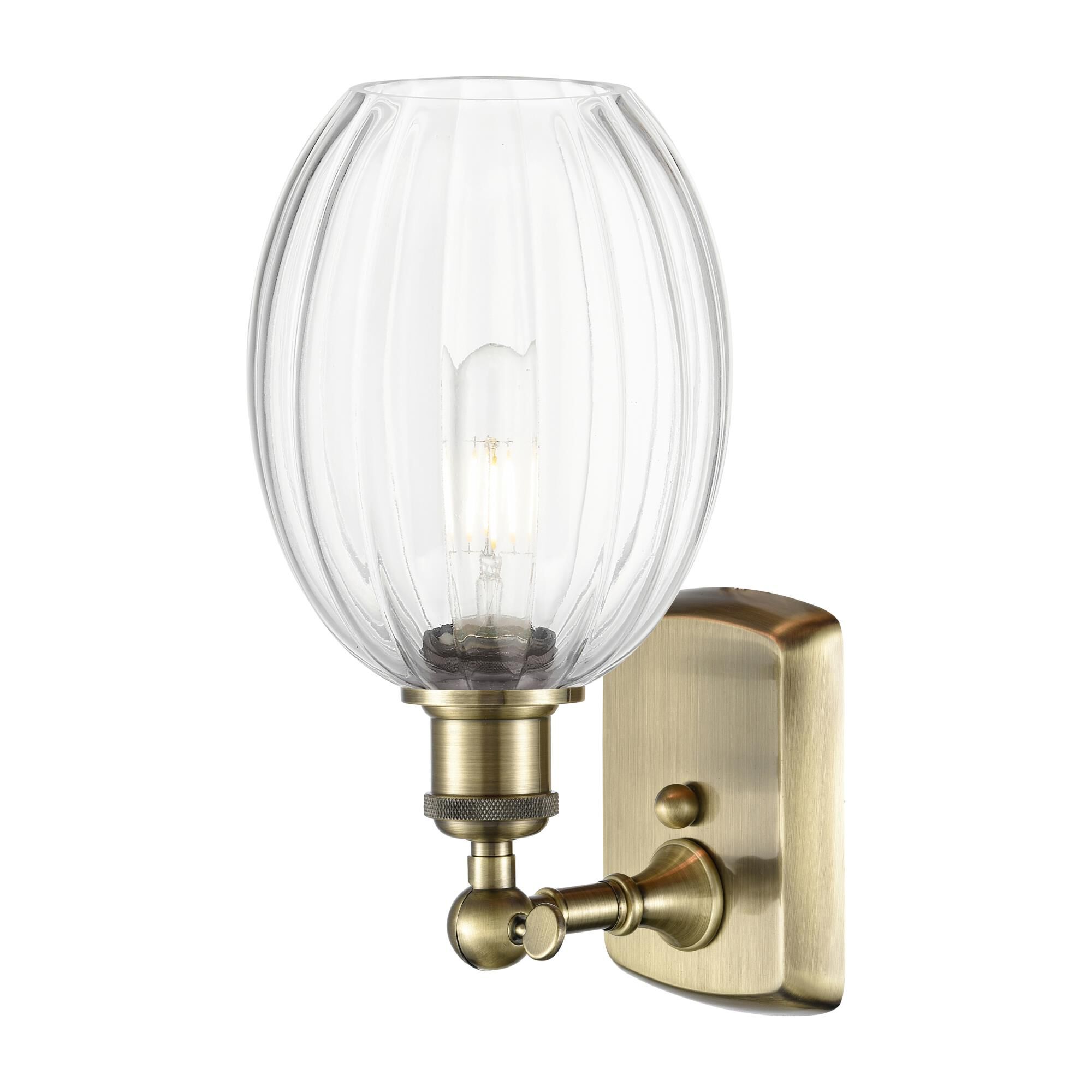 Shown in Antique Brass finish and Clear glass