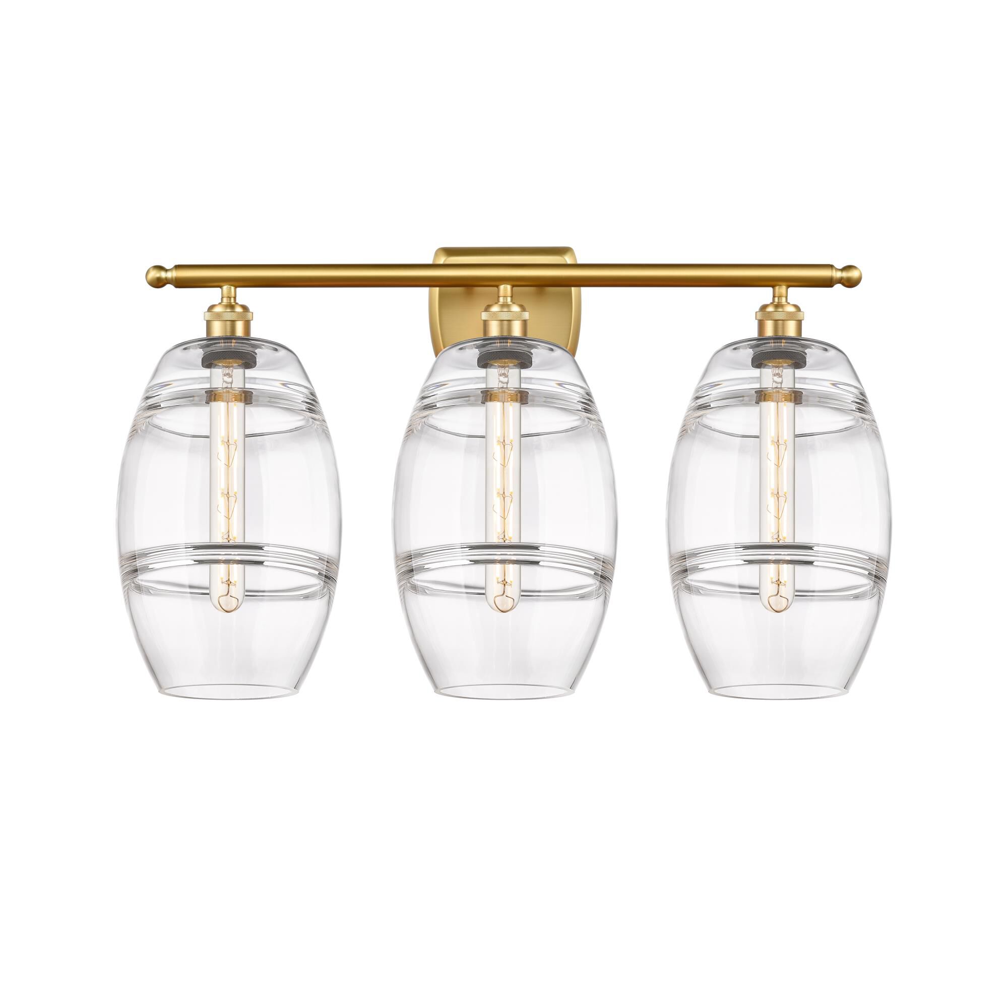 Shown in Satin Gold finish and Clear glass