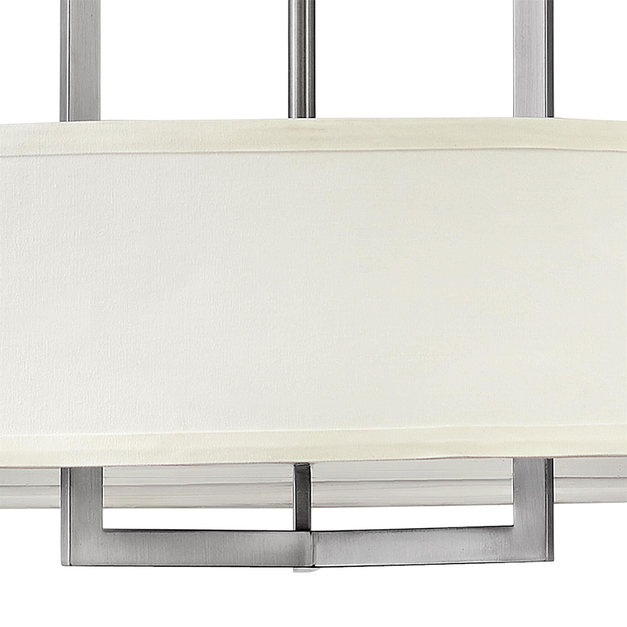 Shown in Antique Nickel finish and Off-White Linen Hardback shade