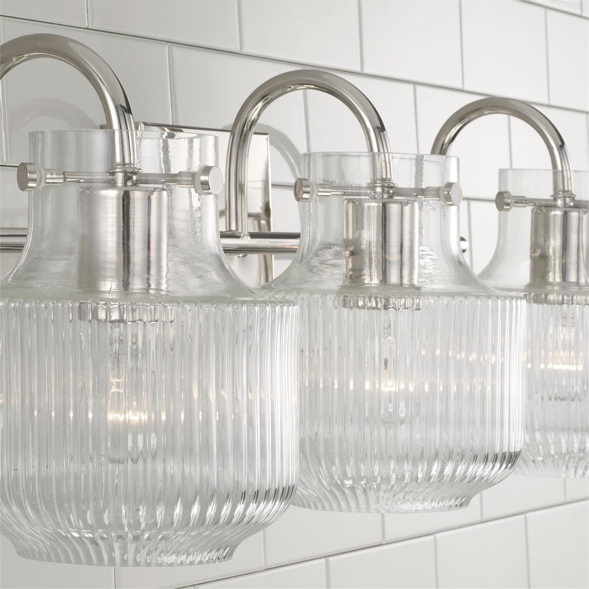 Shown in Polished Nickel finish and Clear Fluted glass